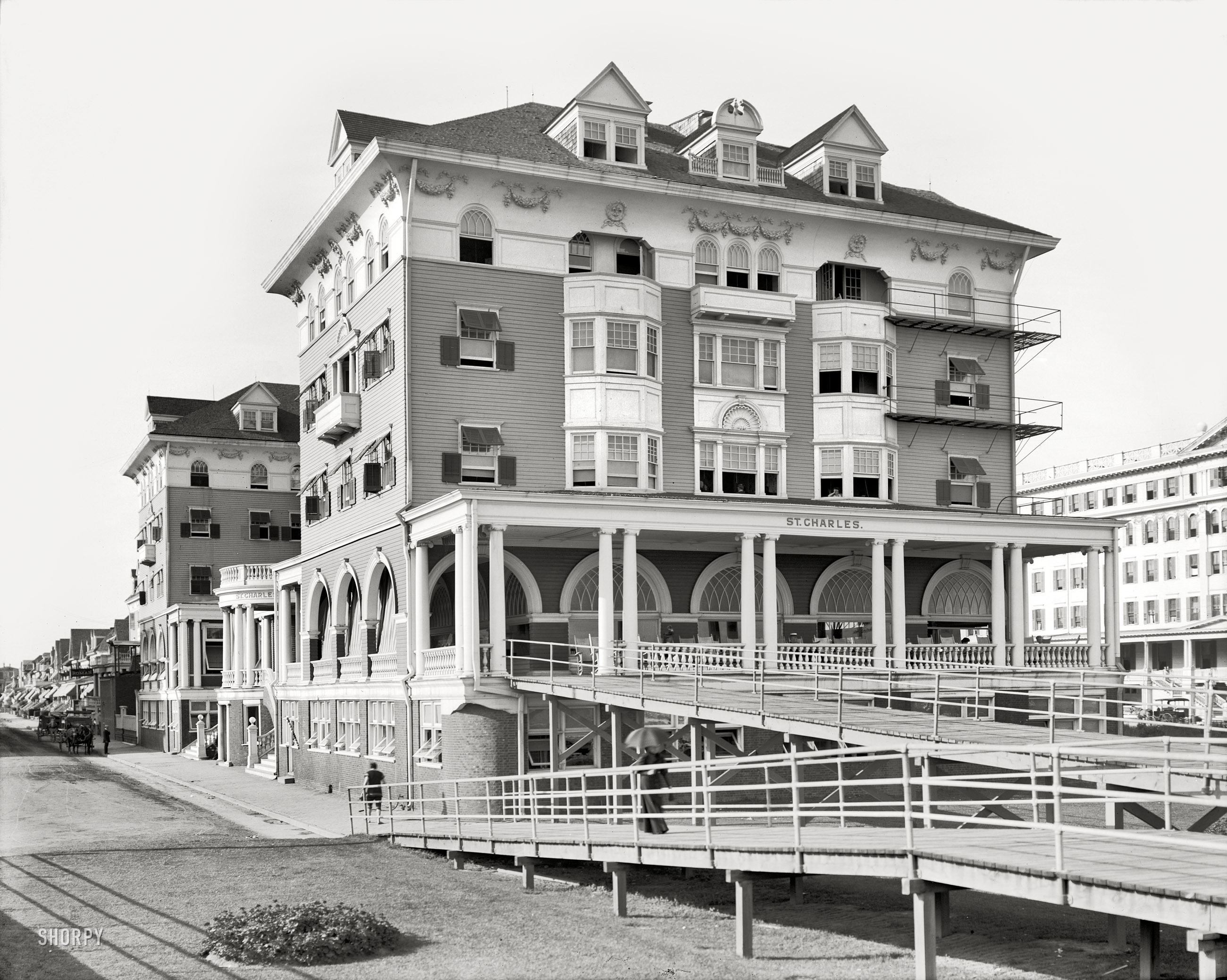 Atlantic City, New Jersey, circa 1910. "Hotel St. Charles." It's getting to be that time of year again -- the season for bathing-costumes, salt air and Boardwalk rolling chairs. 8x10 glass negative, Detroit Publishing Co. View full size.