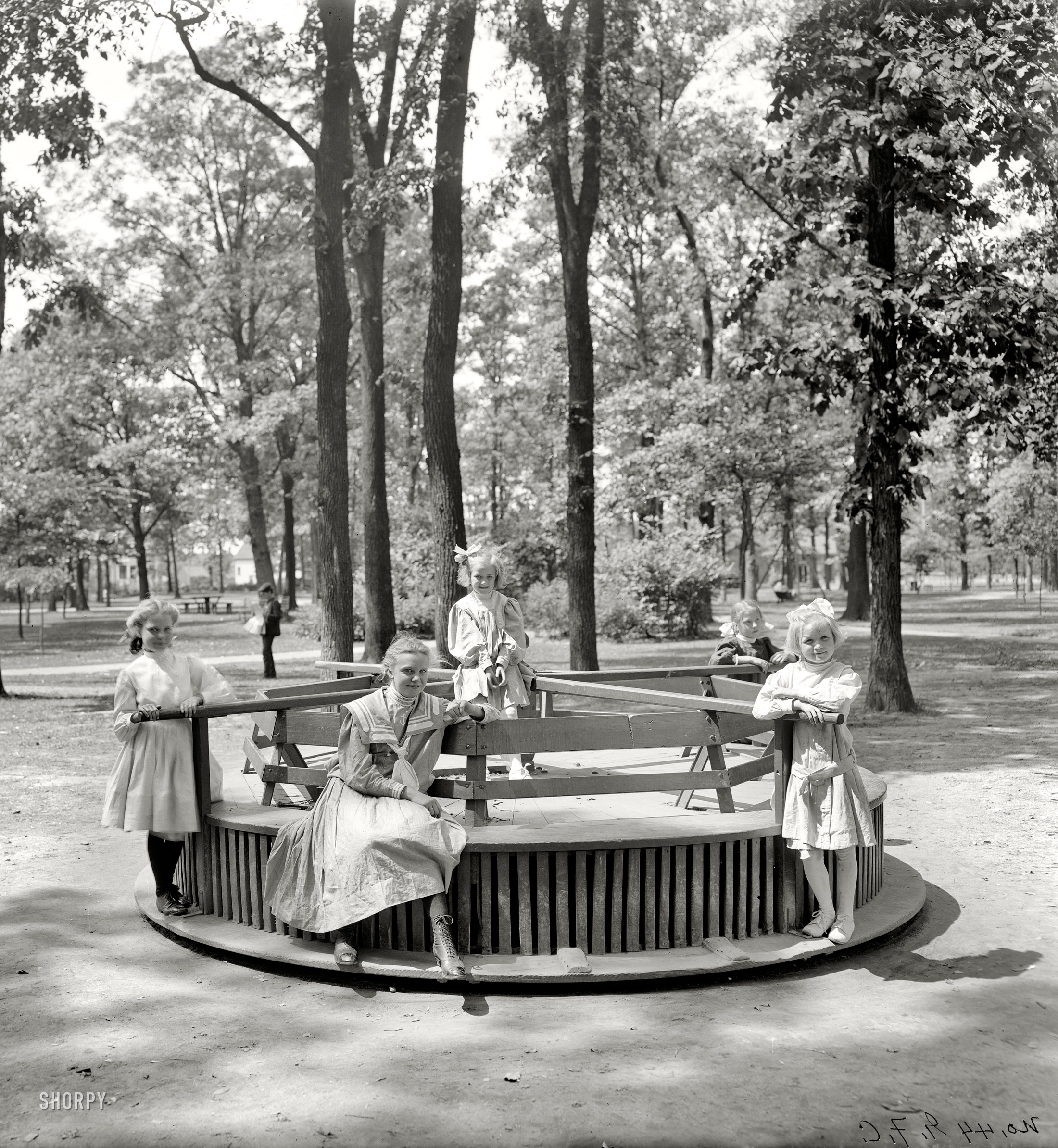 Detroit, Michigan, circa 1900. "Merry-go-round in Clark Park." 8x10 inch (cropped) dry plate glass negative, Detroit Publishing Company. View full size.