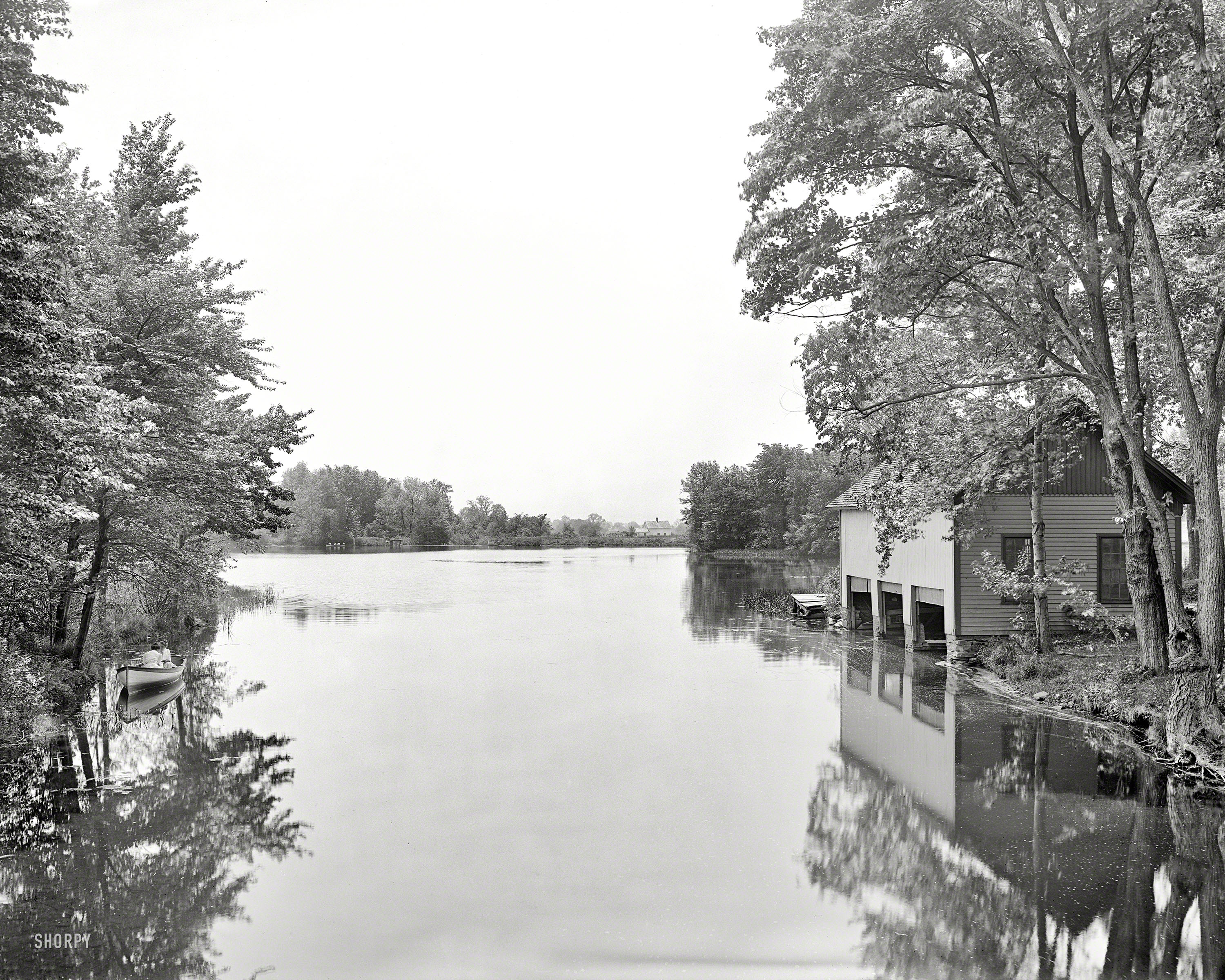 Circa 1908. "Lake Nonotuck boathouse, Mount Holyoke College, South Hadley, Mass." Two girls in a rowboat, probably talking about you. View full size.