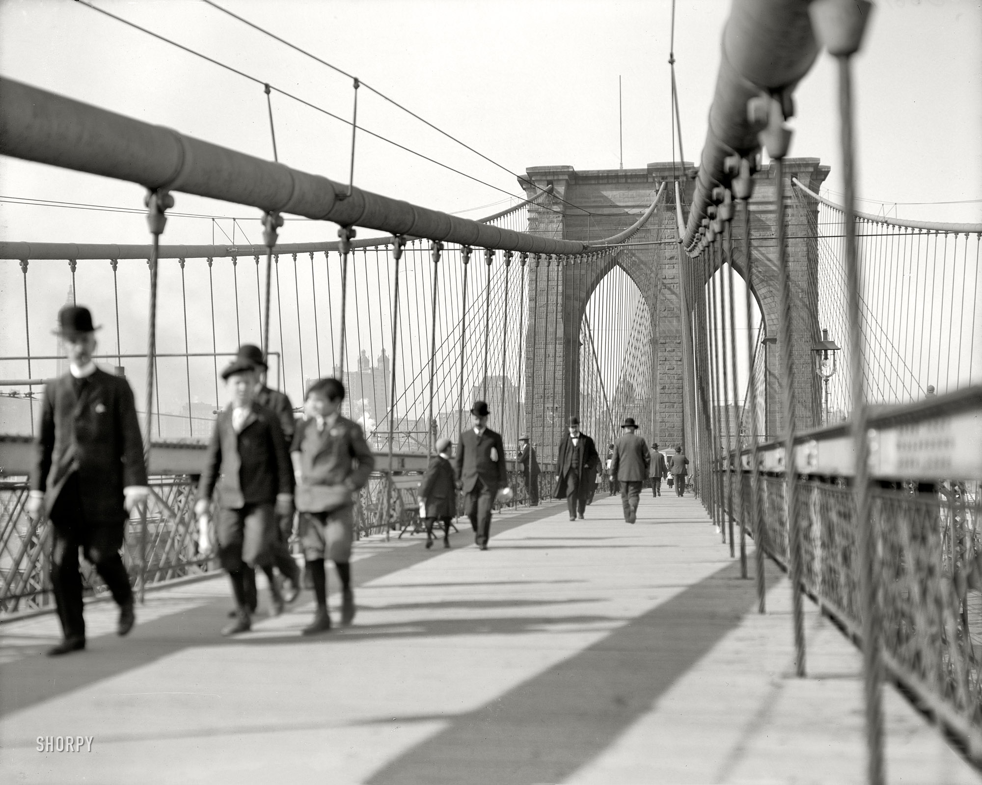 New York circa 1908. "Brooklyn Bridge." It seems like only 38,000 yesterdays. 8x10 inch glass negative, Detroit Publishing Company. View full size.