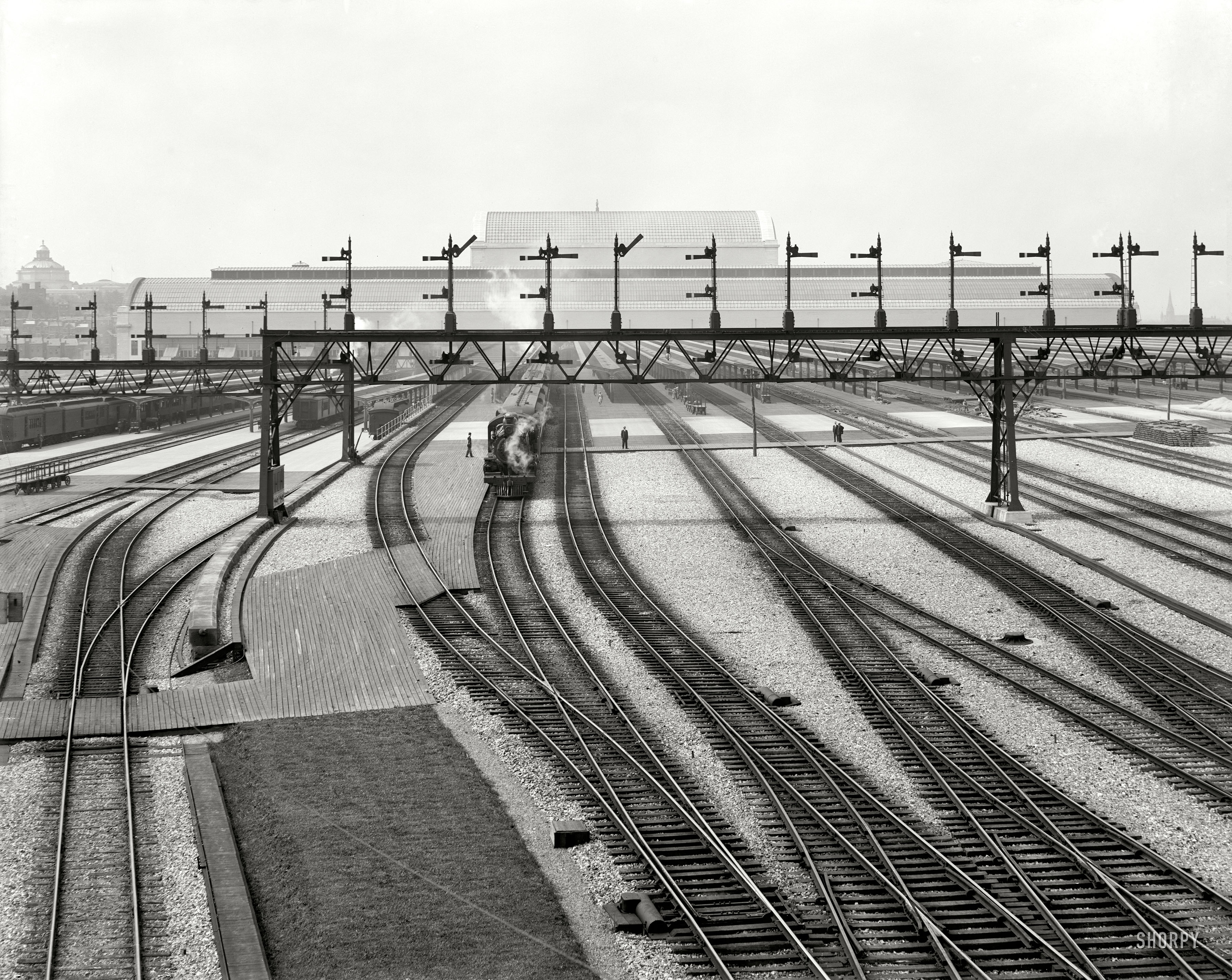 Washington, D.C., circa 1908. "Switch yards, Union Station." Tracks last seen here in April, back for another glimpse of the well-ordered world a century past. 8x10 inch dry plate glass negative, Detroit Publishing Company. View full size.