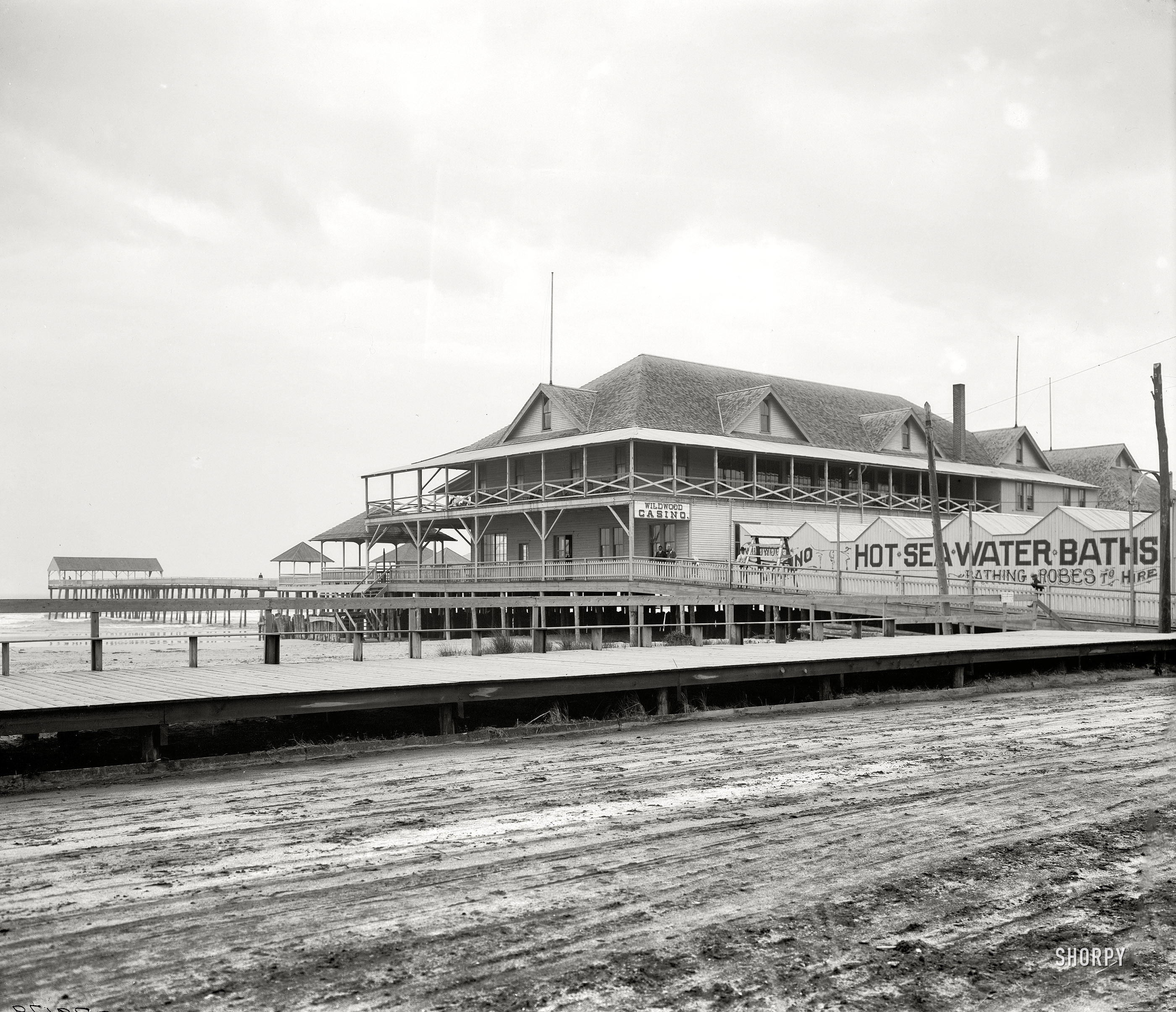 The Jersey Shore circa 1910. "Casino and pier, Wildwood." A popular amenity: "Bathing robes to hire." Detroit Publishing glass negative. View full size.