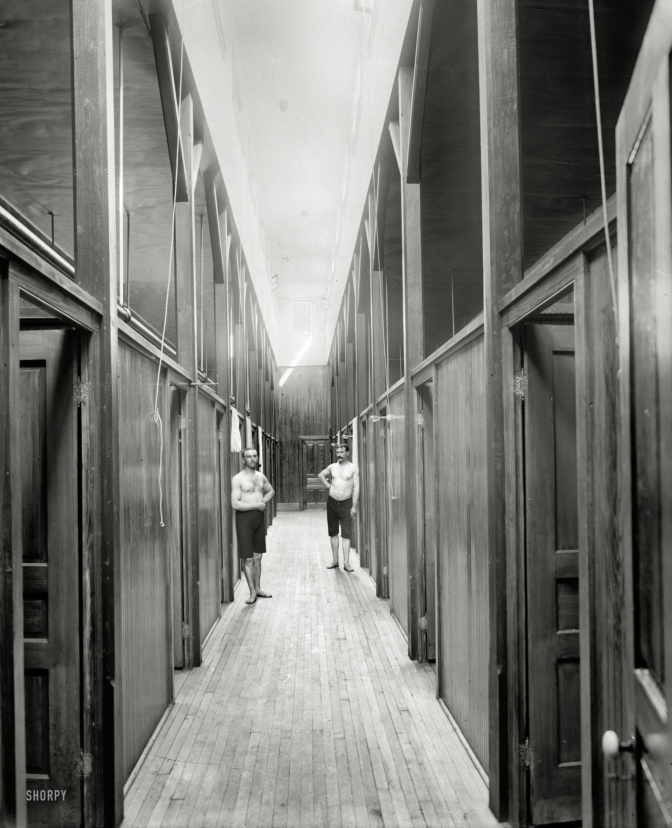 Ypsilanti, Michigan, circa 1900. "Two men in corridor of Mineral Bath House." 8x10 inch dry plate glass negative, Detroit Publishing Company. View full size.