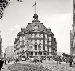 New York circa 1905. "City Hall Post Office." Designed by Alfred Mullett, completed in 1880 and demolished in 1939, the building was derided as "Mullett's Monstrosity" by its numerous critics. Detroit Publishing Co. View full size.
A talented draftsman, not an architectOver his career Mullett produced some 40 government buildings, and two of his six huge Second Empire piles remain standing in St. Louis and Washington. During the Modernist period, critics accused him of using overblown ornament to hide weak form. 
State, War and NavyThe State, War and Navy Building next door to the White House (now the Eisenhower Executive Office Building) was also designed by the flamboyant Mr. Mullett.

Coal dumperMy favorite part of this picture is the coal wagon. Does anybody know how it worked? 
Hm.I wonder what kind of haircut Mullet had?
Architectural AgglomerationI think it's kind of wonderful. The effect is fascinating.
Look at all that horse effluviaI'm pretty sure that puddle to the right is not rainwater. These streets must have stunk in warm weather.
Early coal truckI remember something similar from the 50's though it was from a truck which pulled up outside, extended a metal chute in through a basement window, the bed tilted up and the coal slid downstairs near the furnace.
Where was this?I work in downtown NYC.  Since this was called City Hall Post Office, I assume it was in this area.  The wedge shape of the building makes me think it was probably located where City Hall Park is now.
[It across the park from City Hall. When the building was demolished, the land was used to enlarge the park. - Dave]
I guess I understand whyThere's certainly a lot going on--or, to be more precise, there's a lot of repetition of just a handful of architectural elements. Still, it's nicer to my curmudgeonly eyes to anything Frank Gehry every wadded up.
Ugly  SuccessHate it if you want, but how many people successfully created and sold over 40 building designs? Evidently, someone liked it. 
The MonsterI think they were right back then. It looks like it's moving toward me, like the "blob". Maybe it is violating "design dimensions" that we used to, like too heavy on top for its height. 
Count the architectural stylesGeesh. I think I'm up to about 12 here. Did this guy pull out every architectural history book on his shelf and plop elements onto this facade or what?
Second Empire for the Empire StateI could have been worse: they could have hired Frank Furness.
ImhoI've seen many pictures of this building and always thought it was stunning. It's like wedding cake of iron and stone. 
UNFAIR!If Alfred B. Mullett's New York Post Office had survived another 30 years or so, we wouldn't be calling it a monstrosity. Look at how critical opinion has turned around 180 degrees on the topic of his best known surviving work - the former State, War, and Navy Building (now the Eisenhower Executive Office Building) in Washington (shown a few years ago on Shorpy). Sometimes it seems that the Second Empire Style just can't get an even break!
Why?Put a gigantic pipe organ inside, fire up some pizzas and it could have become world famous!
Lego Land!I don't know that I would call it a monstrosity. It is pretty busy, though, and those lower columns really ARE eyesores. I keep thinking Legos were involved in the construction.
No Horse PileThis building is the definition of the word "pile," but, you know what, I kind of like it. At least it has symmetry. I think it's better (and at least less massive) than his similar buildings still extant in Washington and St. Louis, and much better than his boring post offices, customs houses, and courthouses around the country. I wish it still existed.
Somehow this solid block of building had a floor collapse that killed three people. Mullett himself seems like he was a real explosive, interesting character too.
I'm really liking that jeweler's clock and the streetlamps (particularly the luminaires; are those incandescents? arcs?).
Pure D AwfulI usually like gothic "monstrosities" but this is beyond the pale! Looking at it is like wearing heavy, itchy wool on a hot summer day.
The structure has a Cardassian forehead.If one were to eliminate all the gray from this photo, and just turn it into black and white lines and spaces, it would probably resemble one of M.C. Escher's woodcuts.
It beats the Jimi Hendrix museumWhen I look at places like this I wonder what the top floor rooms were like and what views they had.  When I look at a modern building that appears to be wadded-up aluminum foil, I ask myself, what went wrong here?
Go ahead, HVAC itIt's got awnings, so I'm OK with it.
Give my regardsto Shorpy, remember me to Stanton_Square.
Furness!CGW, you know you DIDN'T say that about Frank Furness! A wonderful architect. And Mullett's rep has waxed and waned over the years, but to me, his buildings (yup, even the gigantic State, War and Navy) enrich a cityscape. The level of detail and articulation he used has been lost since the modernists. Tho I admit that "delicately and subtly proportioned" does not apply to Mullett's work.
Frank FurnessHey, I love his buildings! Alright, maybe they're best in moderation, but don't tell me the world would be better off with fewer of his buildings.
(The Gallery, DPC, NYC, Streetcars)