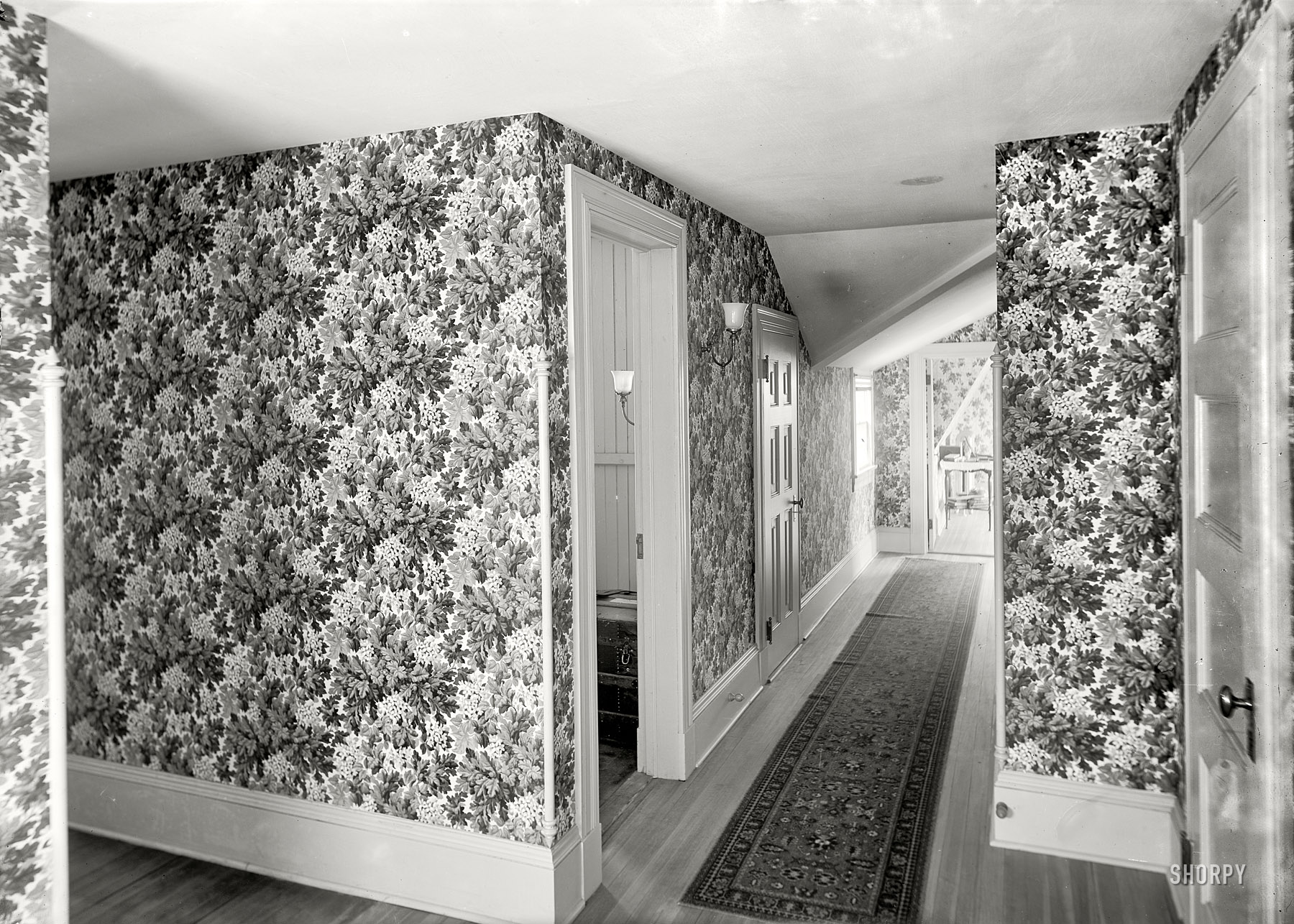 Circa 1910. "Hall with floral wallpaper, probably in a clubhouse, New York." 8x10 inch dry plate glass negative, Detroit Publishing Company. View full size.