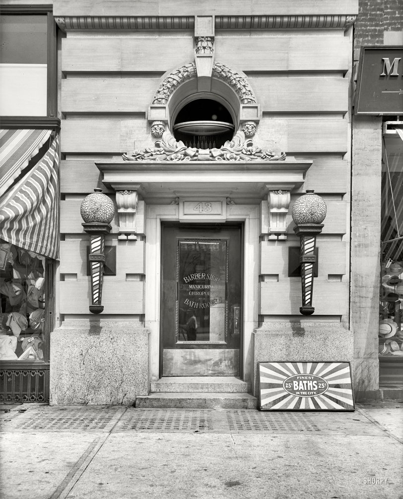 Detroit, Michigan, circa 1915. "Entrance to barber shop, Pardridge &amp; Blackwell building." The usually anonymous Detroit Publishing photographer makes a cameo appearance. 8x10 glass negative, Detroit Publishing Co. View full size.
