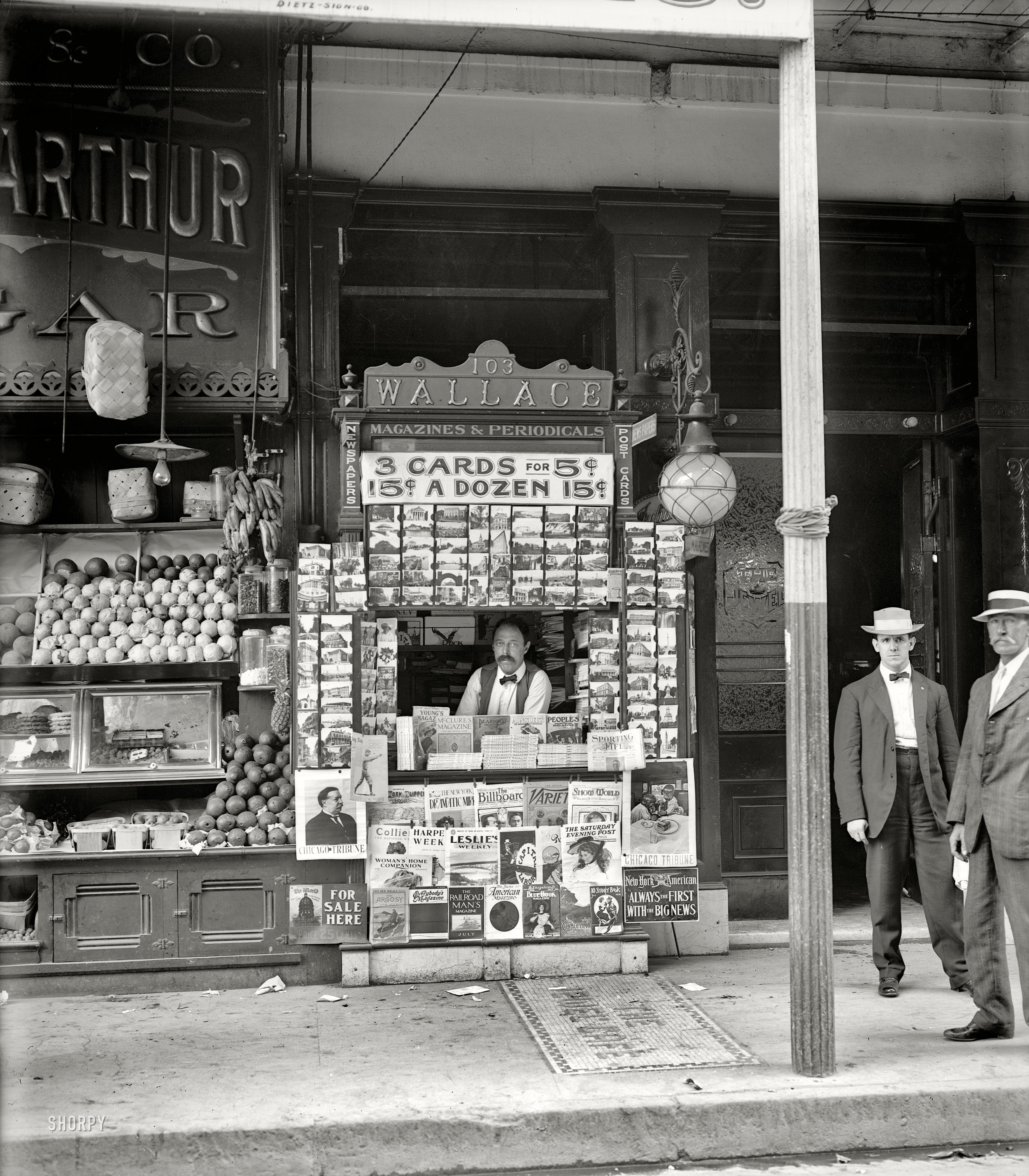 1908. "Smallest news & post card stand in New Orleans, 103 Royal Street." 8x10 inch dry plate glass negative, Detroit Publishing Company. View full size.