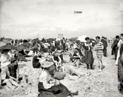 Coney Island, New York, circa 1904. "Getting their picture took." 8x10 inch dry plate glass negative, Detroit Publishing Company. View full size.