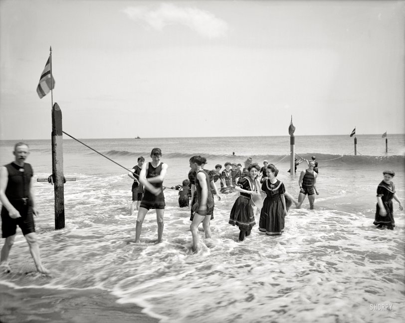 Coney Island, New York, circa 1905. "Surf bathing." Splashing around in the ocean -- the latest fad. 8x10 inch glass negative, Detroit Publishing Co. View full size.
