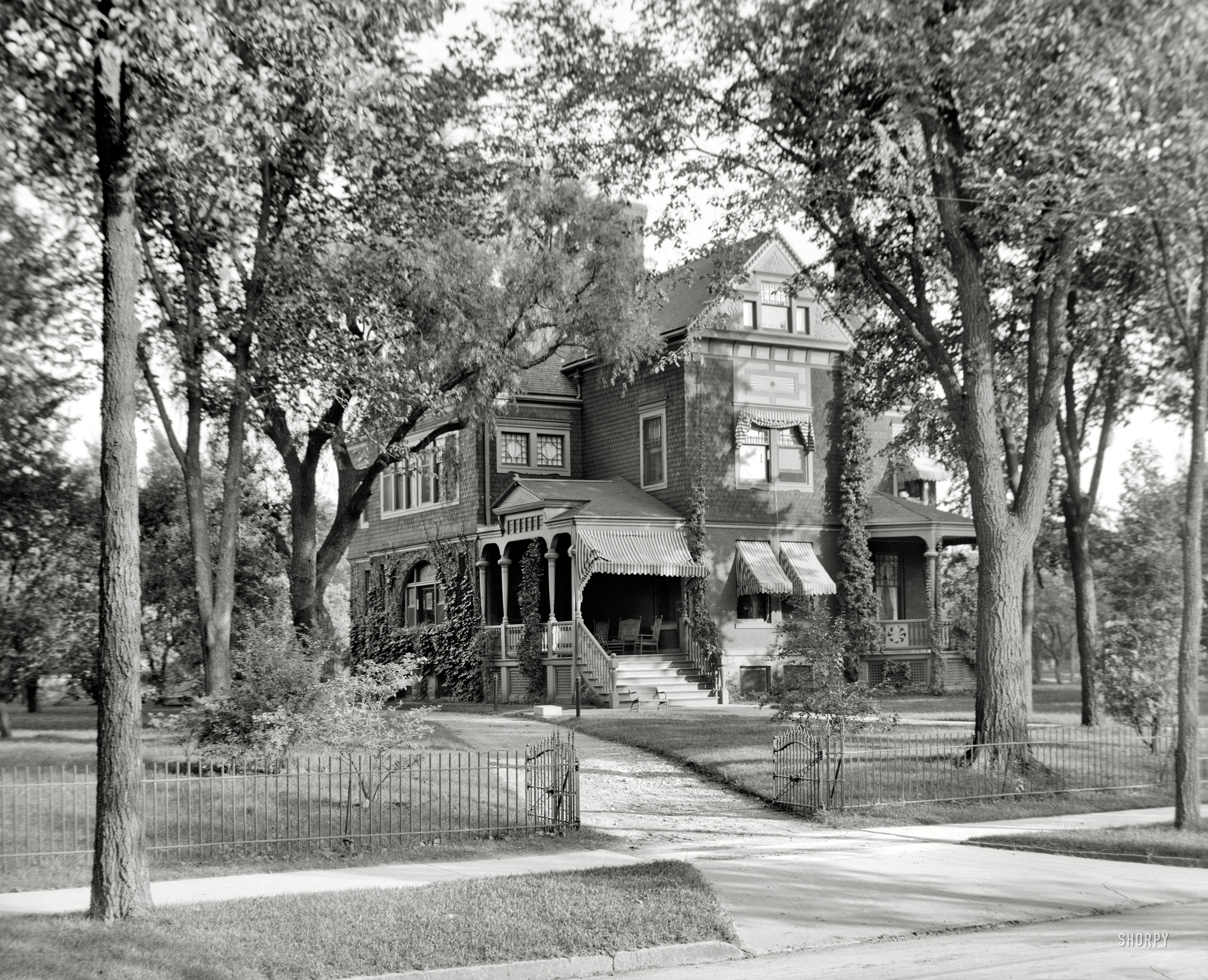 Saginaw, Michigan, circa 1907. "Dr. Henry C. Potter's residence." 8x10 inch dry plate glass negative, Detroit Publishing Company. View full size.
