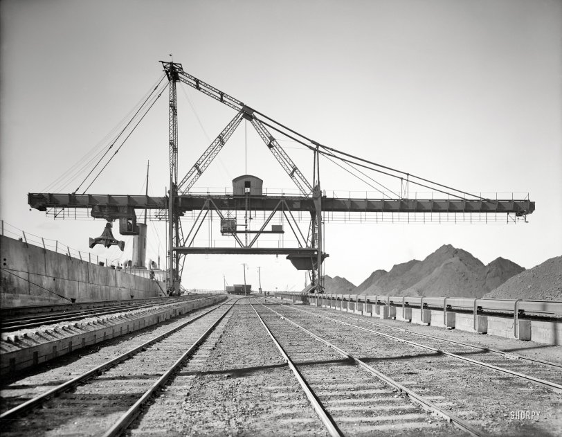 Buffalo, New York, circa 1908. "Brown electric hoist unloading ore carrier." 8x10 inch dry plate glass negative, Detroit Publishing Company. View full size.
