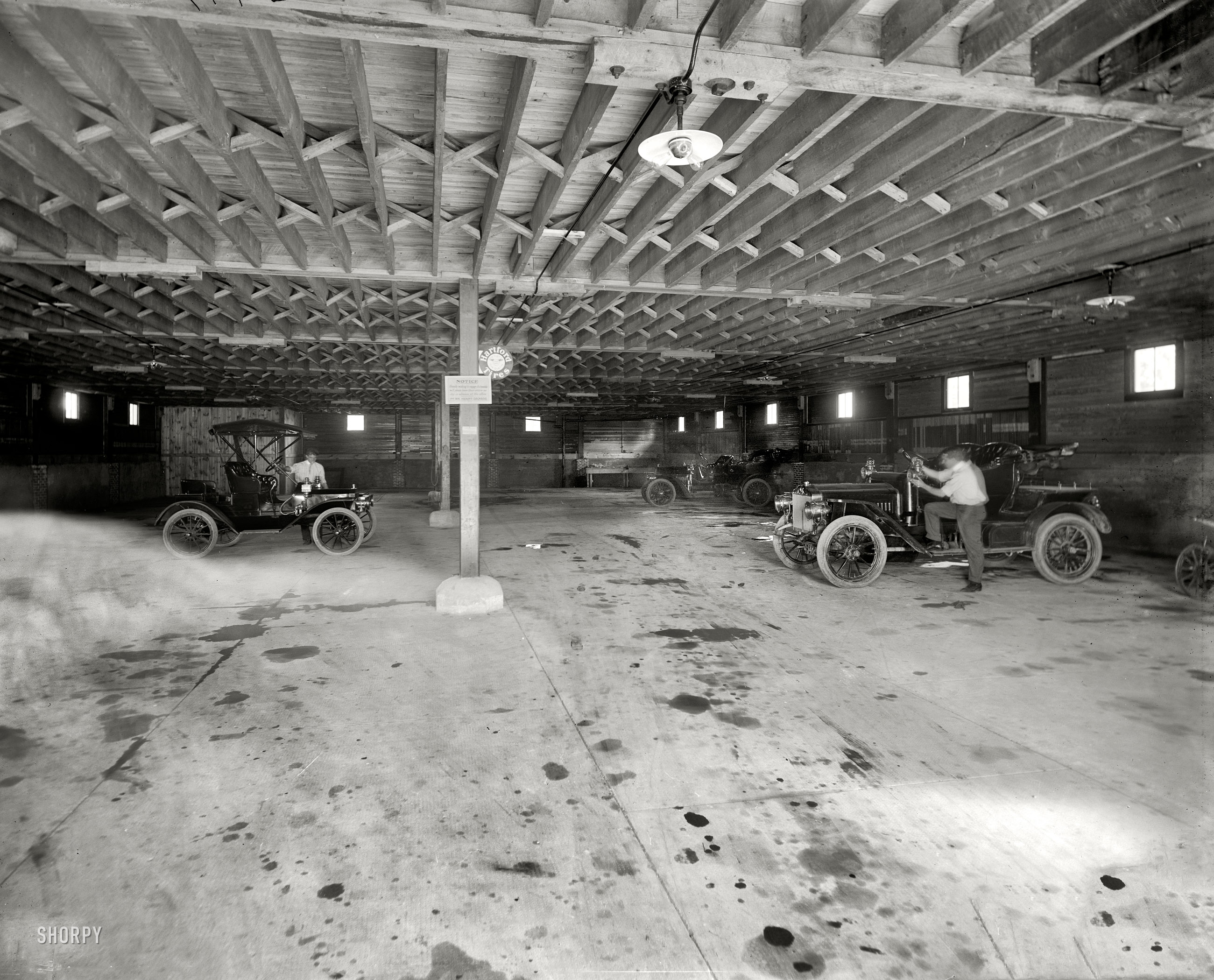 Lake George, New York, circa 1908. "Garage interior, Fort William Henry Hotel." 8x10 inch dry plate glass negative, Detroit Publishing Company. View full size.