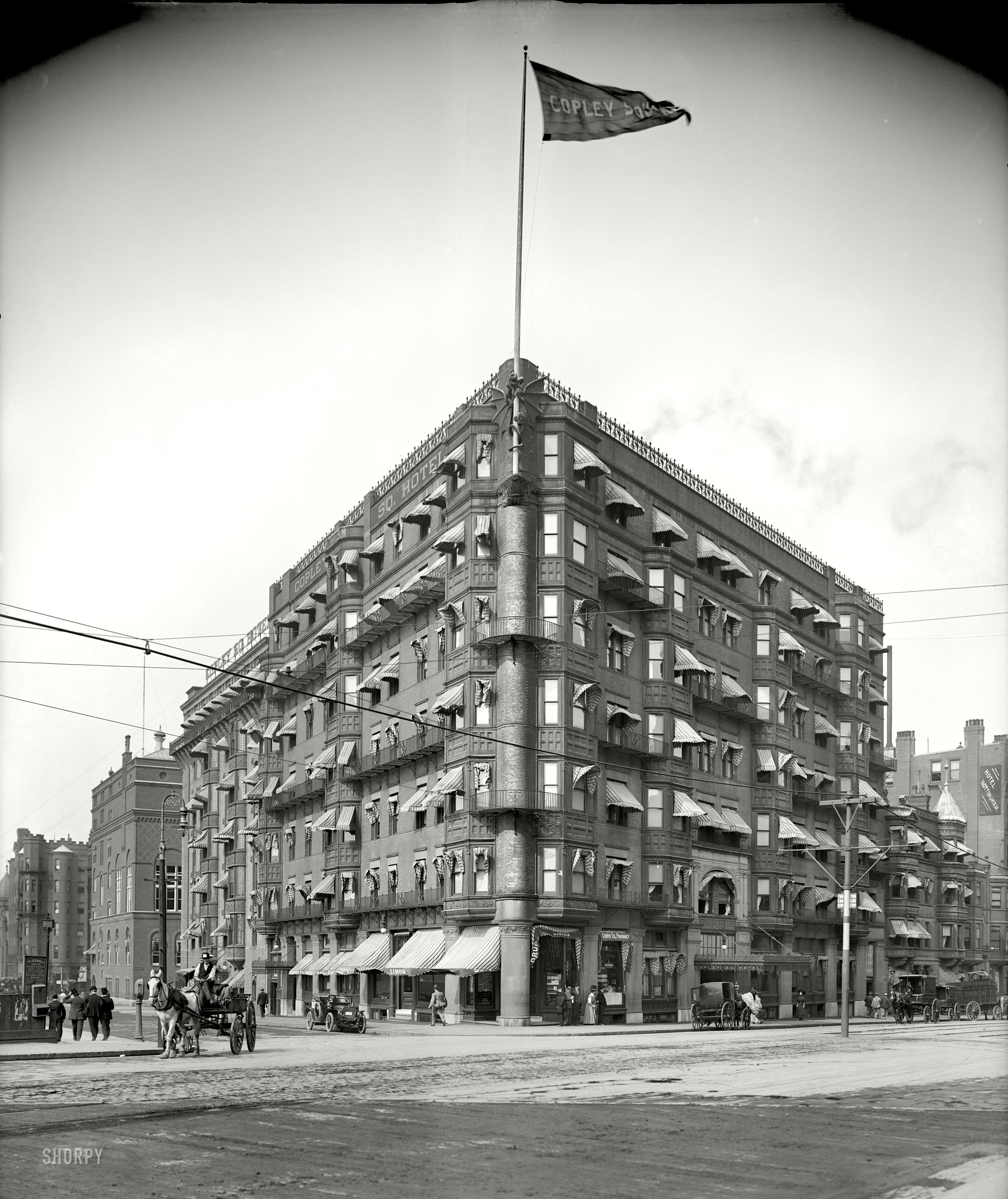 Boston, Massachusetts, circa 1909. "Copley Square Hotel." Check out the scaly mascot slithering up the flagpole. 8x10 inch glass negative. View full size.