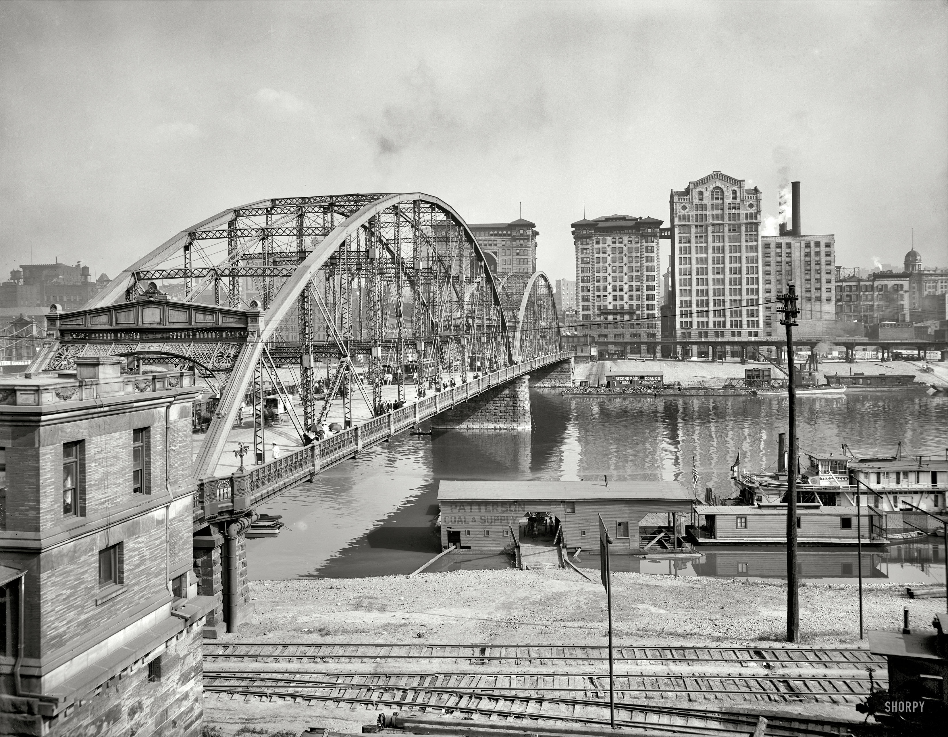 Pittsburgh, Pennsylvania, circa 1910. "Sixth Street Bridge over Allegheny River." In 1927 this span was moved 12 miles to a crossing over the Ohio River, where it spent the remainder of its long life as the Coraopolis Bridge. View full size.