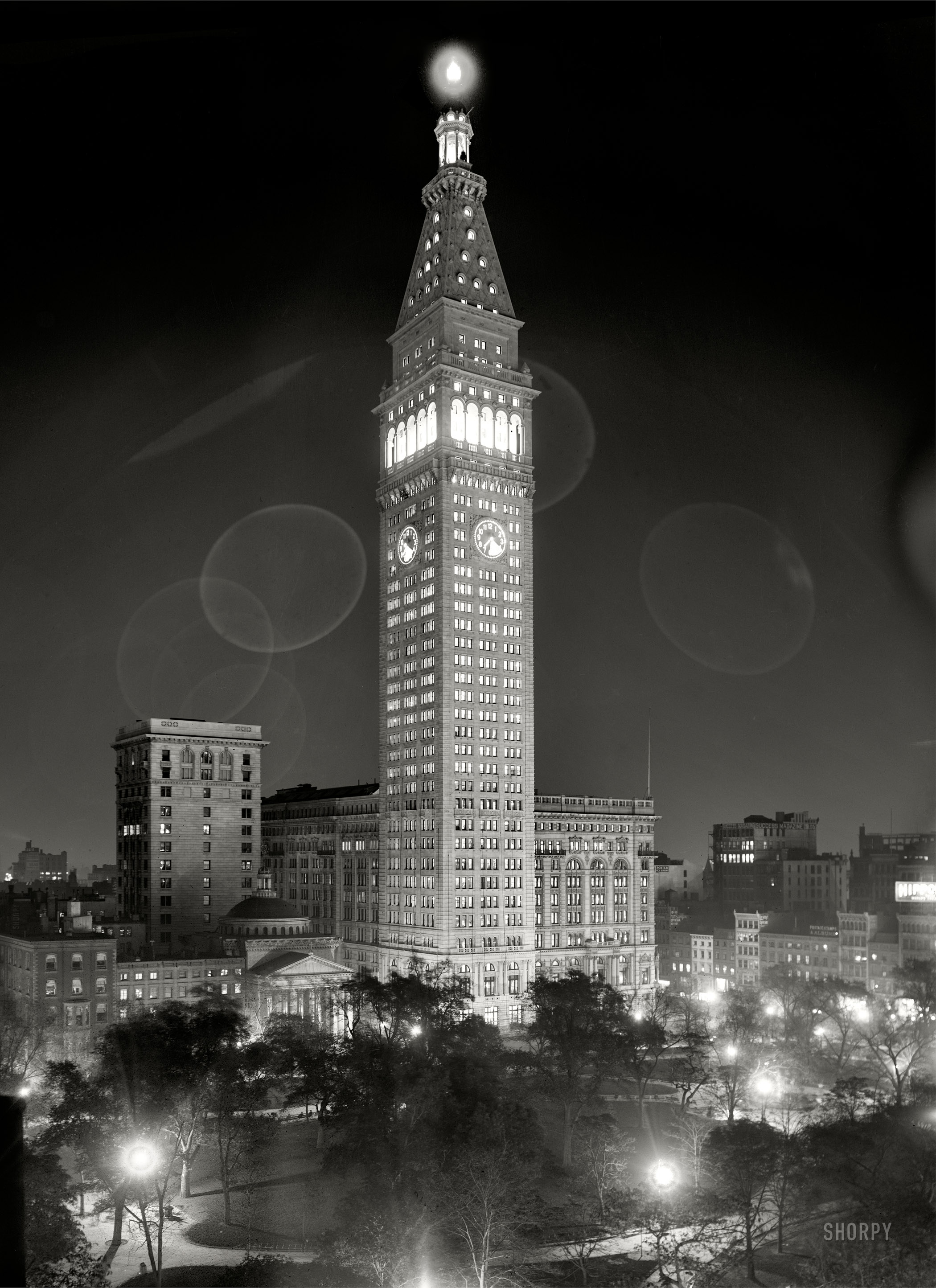 New York City circa 1910. "Metropolitan Life Insurance Company building at night." Note the 10-minute exposure time as recorded by the clock. 8x10 inch dry plate glass negative, Detroit Publishing Company. View full size.