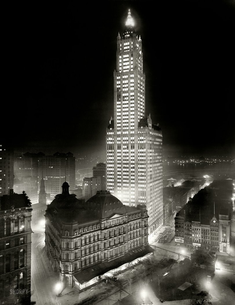 New York noir circa 1913. "The Woolworth Building at night." 8x10 inch dry plate glass negative, Detroit Publishing Company. View full size.
This is, for all intents and purposes, a "new" image for anyone alive today -- a muddy-looking print of it has been available for years in the Library of Congress archive, but it wasn't until last year that the glass negative was imaged and put online. As far as I know this is its Interwebs debut, apart from the LOC website. We did a lot of work to adjust the contrast and get it cleaned up.
