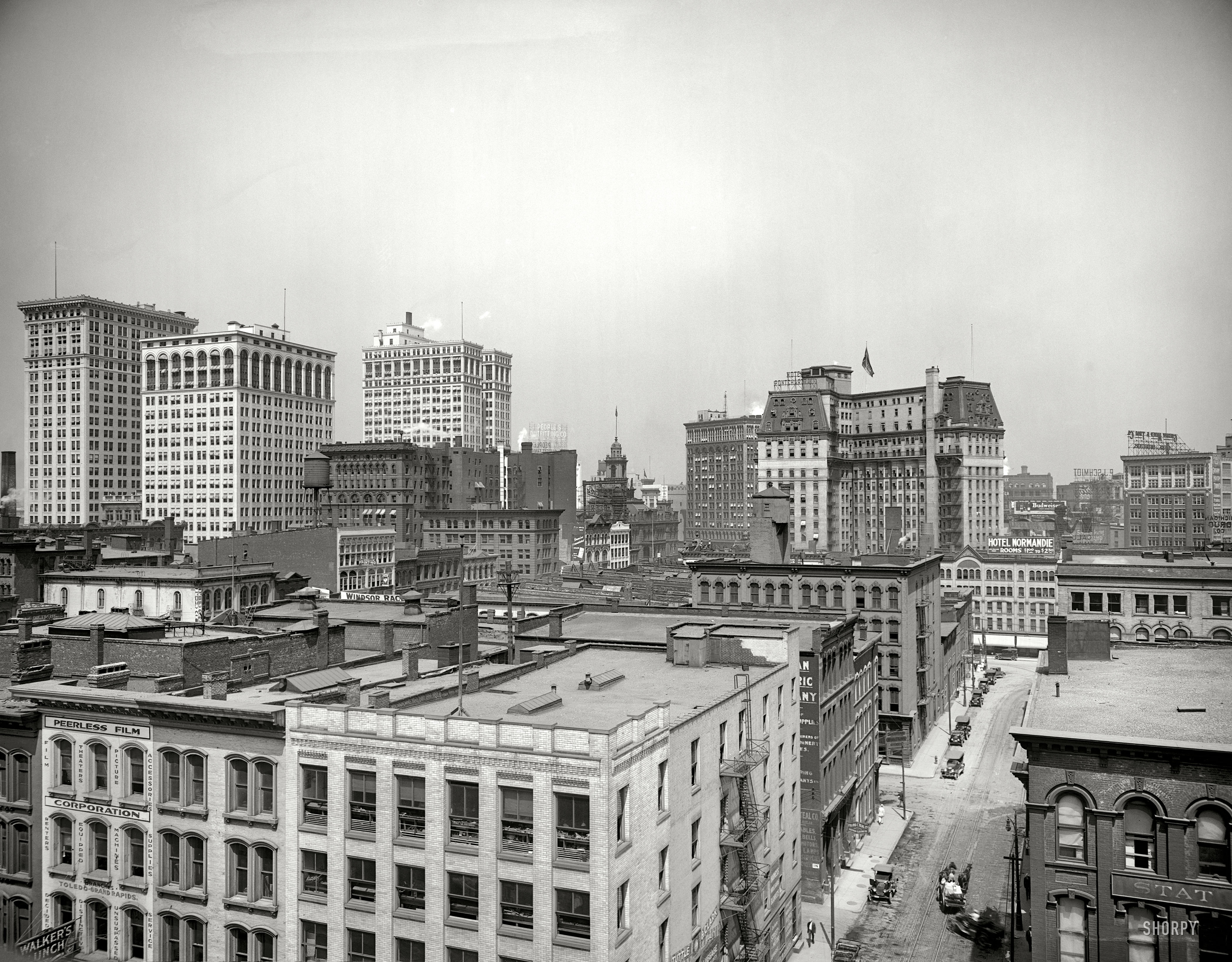 Detroit circa 1917. "Looking northwest from roof of interurban station." Landmarks here include the Hotel Pontchartrain, Ford Building and Dime Savings Bank. 8x10 inch glass negative, Detroit Publishing Co. View full size.