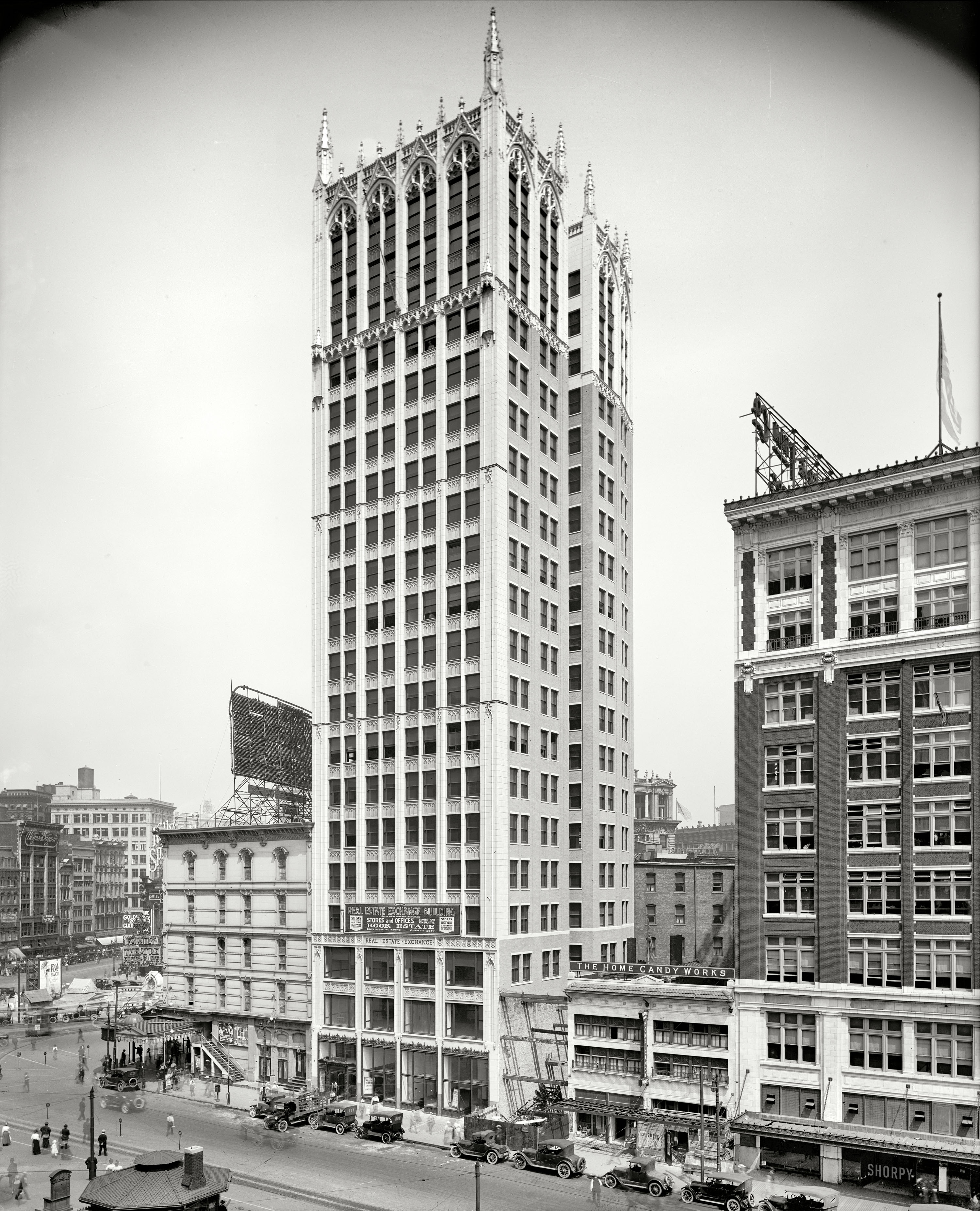 "Real Estate Exchange, Detroit." Shown around the time of its completion in 1918, this Gothic wedding cake of an office tower was known for most of its 58 years as the Cadillac Square Building. Detroit Publishing glass negative. View full size.