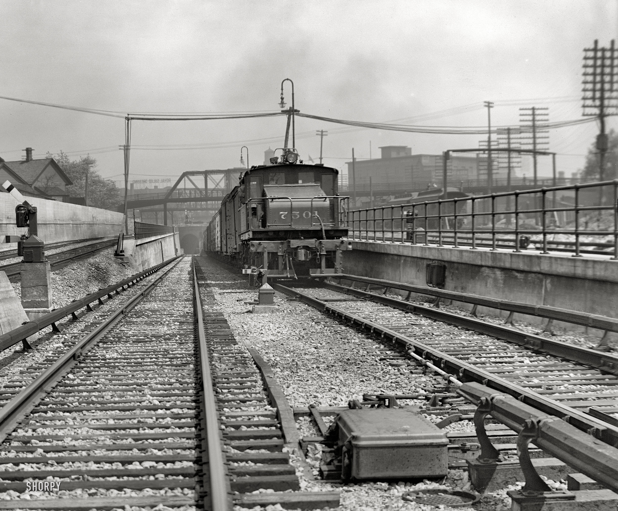 Circa 1910. "Electric engine, Detroit River tunnel." With a plug for Royal Salad Dressing. Dry plate glass negative, Detroit Publishing Company. View full size.