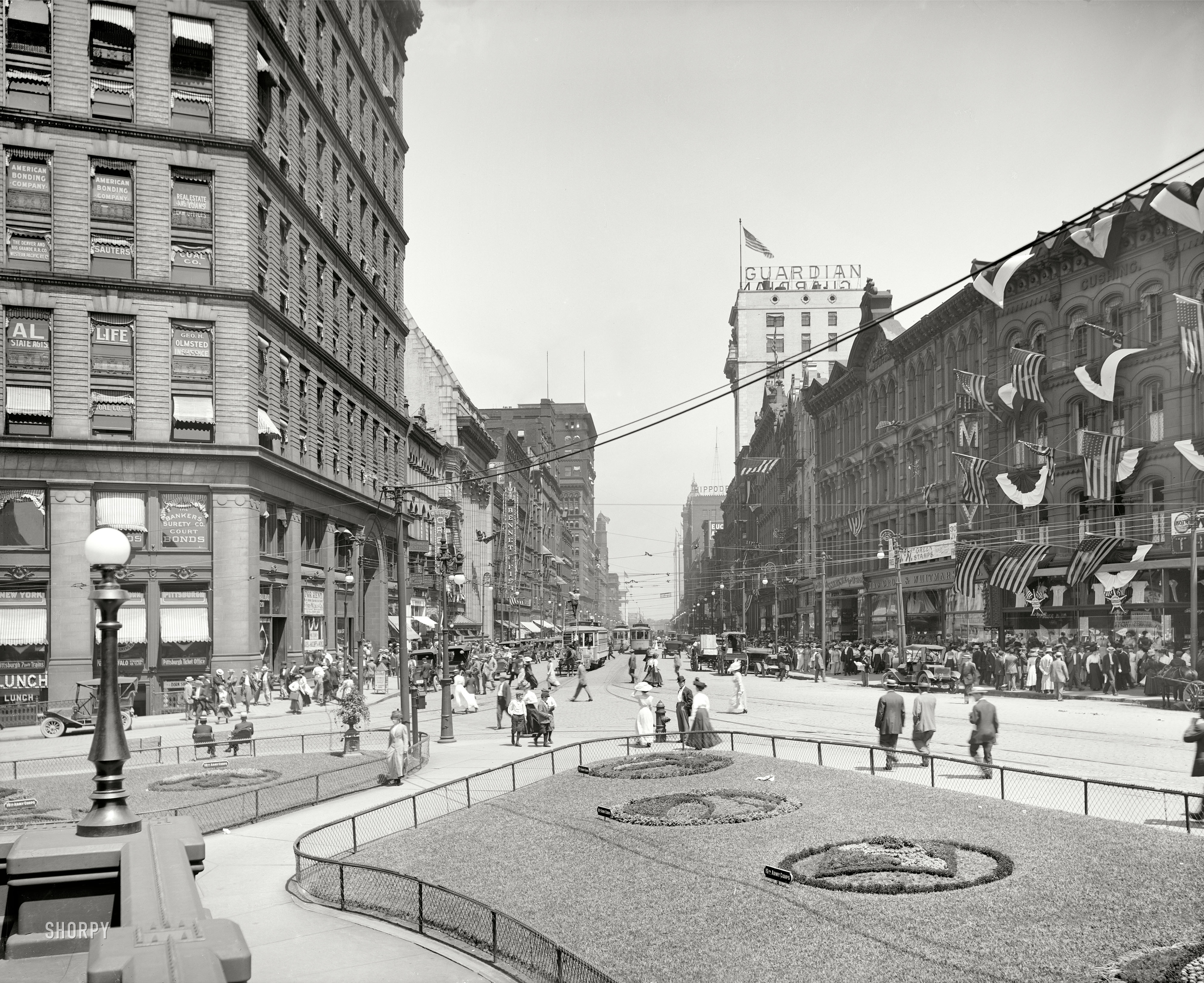 Cleveland, Ohio, circa 1911. "Euclid Avenue, east from Public Square." A close-up of the greenery at the base of the Soldiers' and Sailors' Monument seen in the previous post. 8x10 inch glass negative, Detroit Publishing Co. View full size.