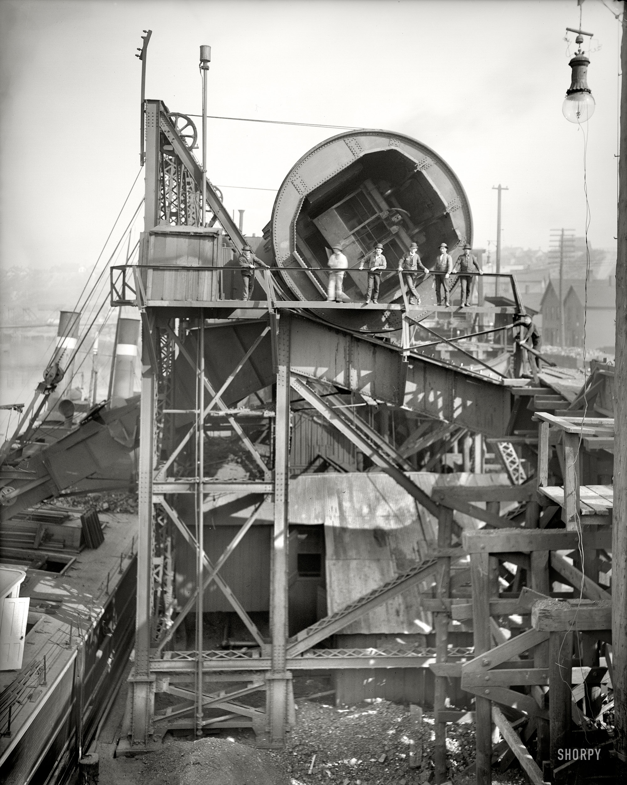 Cleveland, Ohio, circa 1910. "Rotary coal car unloader." Don't try this at home. 8x10 inch dry plate glass negative, Detroit Publishing Company. View full size.
