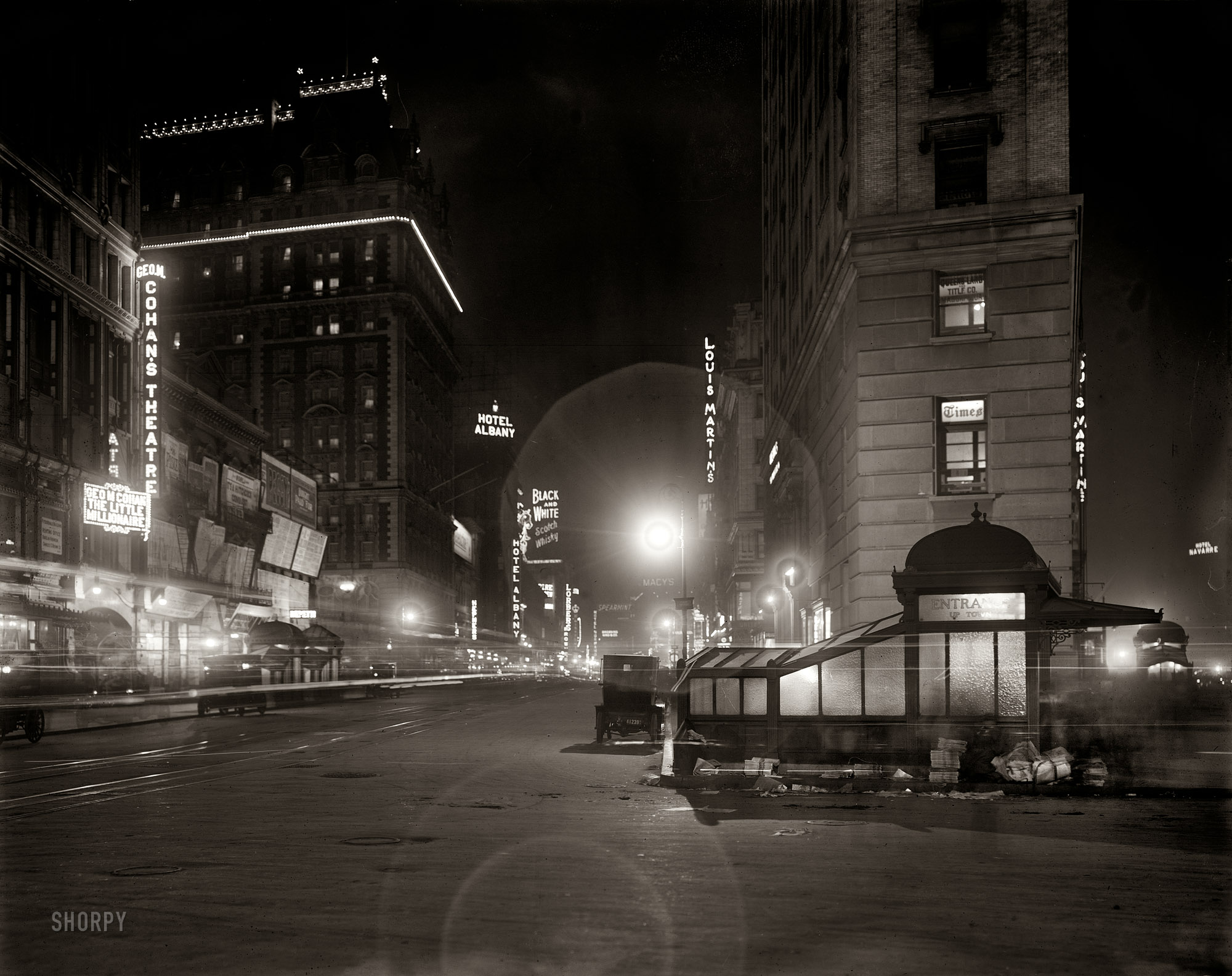 New York circa 1911. "Broadway at night from Times Square." With a phantom or two loitering at the subway entrance. Companion to the night view of Times Square posted here on Monday. 8x10 inch glass negative. View full size.
