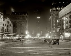 New York circa 1911. "Times Square at night." Now playing at the Astor: Raymond Hitchcock as Cicero Hannibal Butts in the musical comedy "Red Widow." 8x10 inch glass negative, Detroit Publishing Company. View full size.
Pity the poor commaAbused here in the Evans' Pastilles sign:
FOR COLD'S COUGH'S HOARSENESS.  
Some things never change!
[Pity the poor apostrophe -- so often confused with the comma! - Dave]
Why Every Citizen Should Read the ChiefUpper right hand corner has a billboard for New York's Civil Service newspaper, still published today, with the same masthead.
Only in the bizarro Shorpy worldWould it were possible that the character Cicero Hannibal Butts was the great-grandfather of today's real-life stage actor Norbert Leo Butts!
Hail to The ChiefThe Independent Voice of New York City Civil Service Since 1897, so they say.  Still publishing once a week, it was the place to check for info on government jobs in the NYC area before the Internets started laying down their tubes.
Same View--Seven Years laterThis is the same view as found in this post but several years later. Looks like the Packard dealer didn't make it.
https://www.shorpy.com/node/7407
IncredibleCompared to the non-stop intense sounds of Times Square today, that region looks to have been quiet, even peaceful during the time this picture was taken.  Well, peaceful might be a stretch unless you closed your eyes to shield from the already dominant presence of light displays. 
I love both New Yorks.
+99Below is the same view south from 45th Street taken in April of 2010.
A Daunting ChallengeMaking a silent movie that's a musical comedy would be quite a challenge, I'd expect.
[It would be, and it's not a movie. - Dave]
Historical Photos Moments caught on camera that will never be seen again. I love old photos~
Wow! This I really like.What a fantastic and almost unbelievable contrast to today!
ChiropodistIt's almost seven at night. Must be autumn? 
I'm wondering what a Chiropodist was? Someone who cracks your spine with his feet? Someone who handles feet? 
Endearing Times SquareFrom the halo glow of the Hotel sign atop the building to the plethora of illuminated signs, what a treat this magical place is. The automobiles look almost 3D like and so in focus. It's only 9:35 and the night is still young.
How about those cool lanterns on their standards. Oh New York, New York.
Two cabs, no waitingIdle taxis waiting for customers at the hack stand. And the chiropodist -- my mom went to one in the 1950s to get her aching feet checked. Great picture.
Match Game &#039;11Amazing to see how quickly electric lighting became commonplace, and how things looked in the era before neon, although if Wikipedia is correct neon lighting was demonstrated in Paris shortly before this photo was taken.
I see the Match Game is on at the billiard parlor. Probably where Brett Somers made her debut.
Louis MartinsVisible on 42nd Street are signs for both the Broadway and Seventh Avenue entrances for this 5,000 seat restaurant and lobster palace. It was the reincarnation of the elaborate but ill-fated Cafe de l'Opera, which failed when it required evening wear, and served food that cooled during the long trip from the kitchen.
The Great White WayWas bright as it ever was in 1910.
Times Square: The PaintingThe remains of a Chancellor Cigar poster from a drugstore. It took me years to find it depicted Times Square. There's a subway entrance depicted in the right half. I couldn't discern whether there is a similar structure in the photo.
ChiropodyThe Chiropodist treated both hand and foot.
Chiropody, and emptinessYes, a chiropodist is someone who handles feet - specifically, treats things like bunions, corns etc. They're still known as such in the UK (I think they're podiatrists now in the US but I might be wrong!)
I love the cars/taxis! And how empty it looks. I've never seen it like that. Was it realyl short exposure so all the people are blurred and not really visible?
(The Gallery, DPC, NYC)