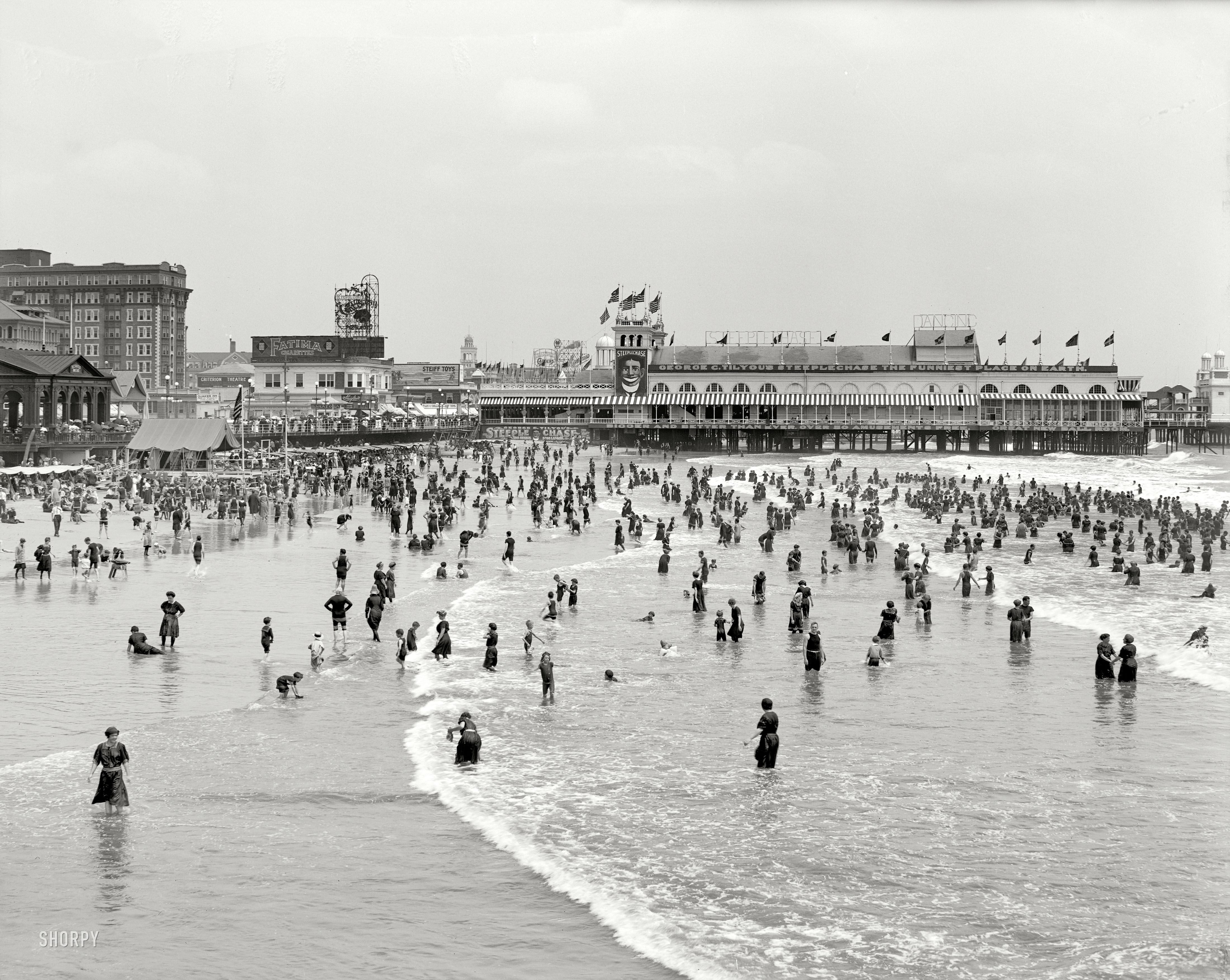 Atlantic City circa 1911. "Bathing at the Steeplechase." George C. Tilyou's Steeplechase Pier and some interesting signage, including a bear-filled Steiff Toys billboard. 8x10 inch glass negative, Detroit Publishing Company. View full size.