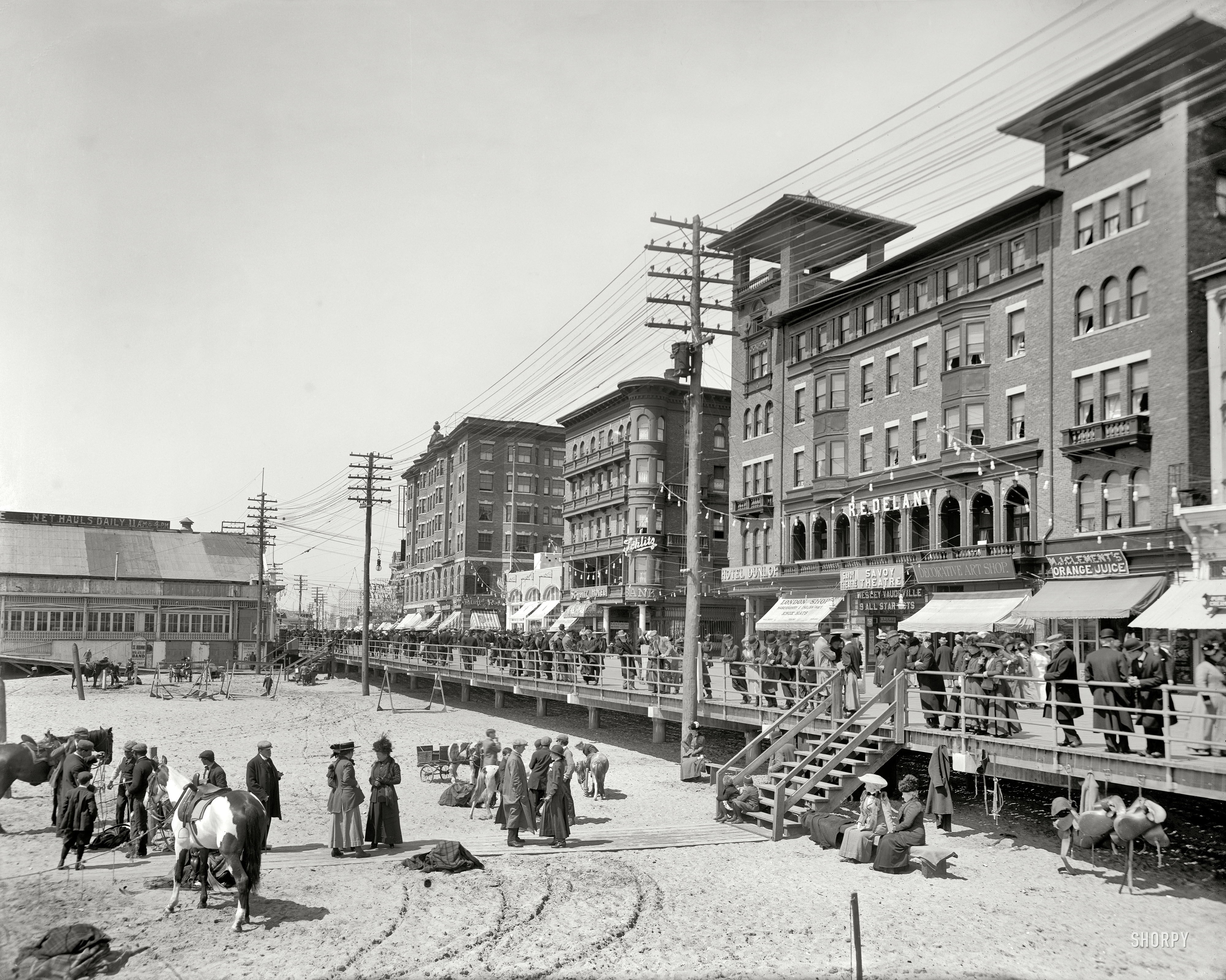 Atlantic City, New Jersey, circa 1911. "Savoy Theatre, Schlitz & Young's hotels." 8x10 inch dry plate glass negative, Detroit Publishing Company. View full size.