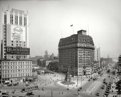 Detroit circa 1918. "Woodward Avenue, south from the Majestic building." Cadillac Square and the Soldiers and Sailors Monument with the Hotel Pontchartrain on the right and the Real Estate Exchange at left. At the Gayety: "Higher Grade Burlesque." Detroit Publishing glass negative. View full size.