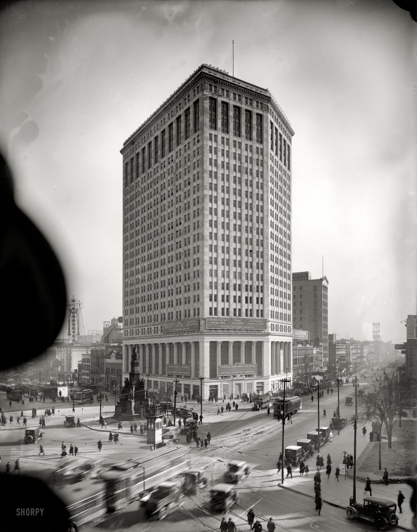 Detroit, Michigan, circa 1921. "First National Bank." The building that replaced the enormous but short-lived Hotel Pontchartrain, a favorite subject of the Detroit Publishing Co. along with the Soldiers and Sailors Monument, another landmark seen here in the vicinity of Cadillac Square and the Campus Martius. Note the traffic control tower and the tally board labeled DETROIT STREET TRAFFIC KILLINGS. 8x10 inch dry plate glass negative. View full size.
