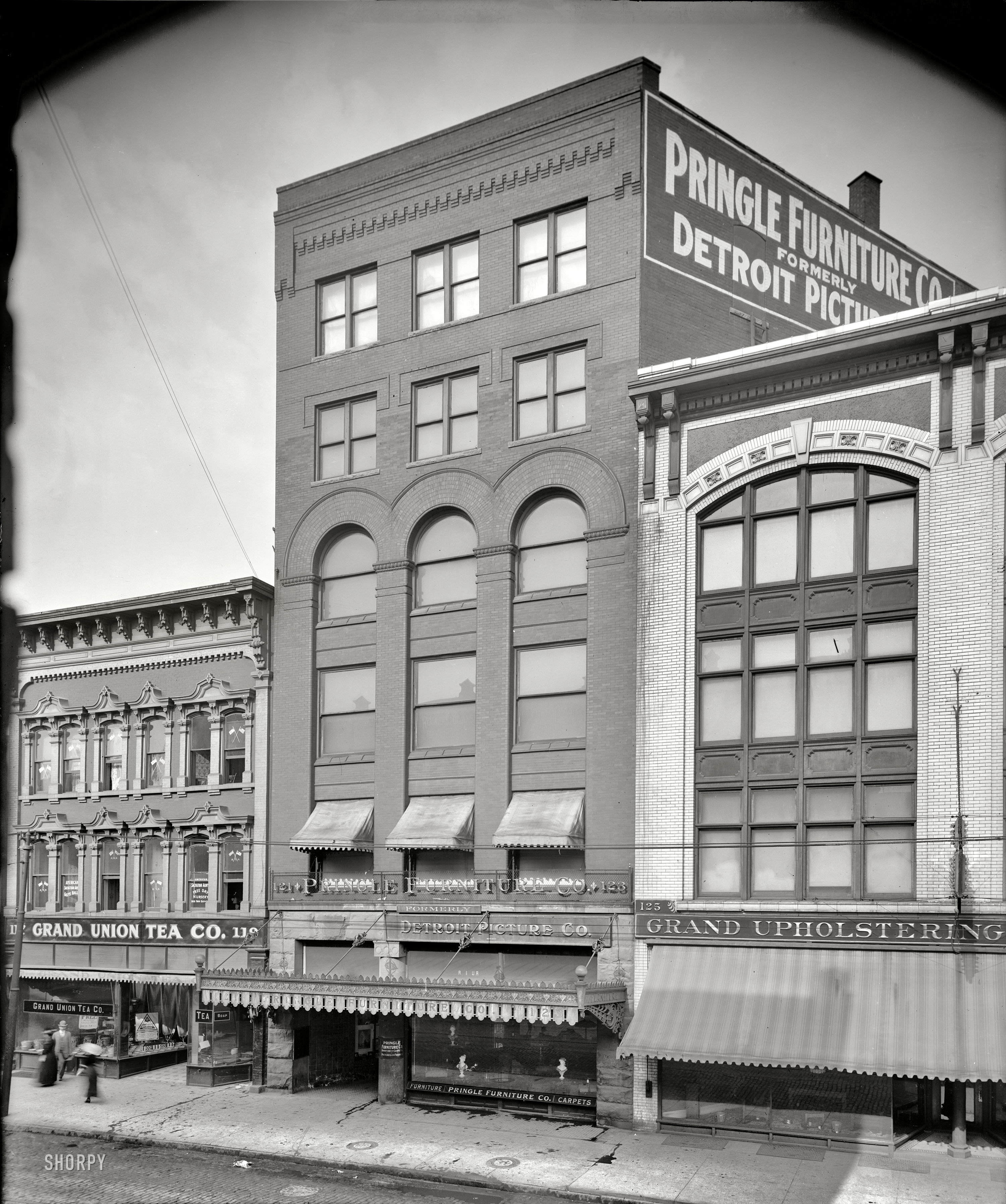Detroit circa 1912. "Pringle Furniture Co., Gratiot Avenue." Establishing shot of the home-furnishings crypt seen here. 8x10 glass negative. View full size.