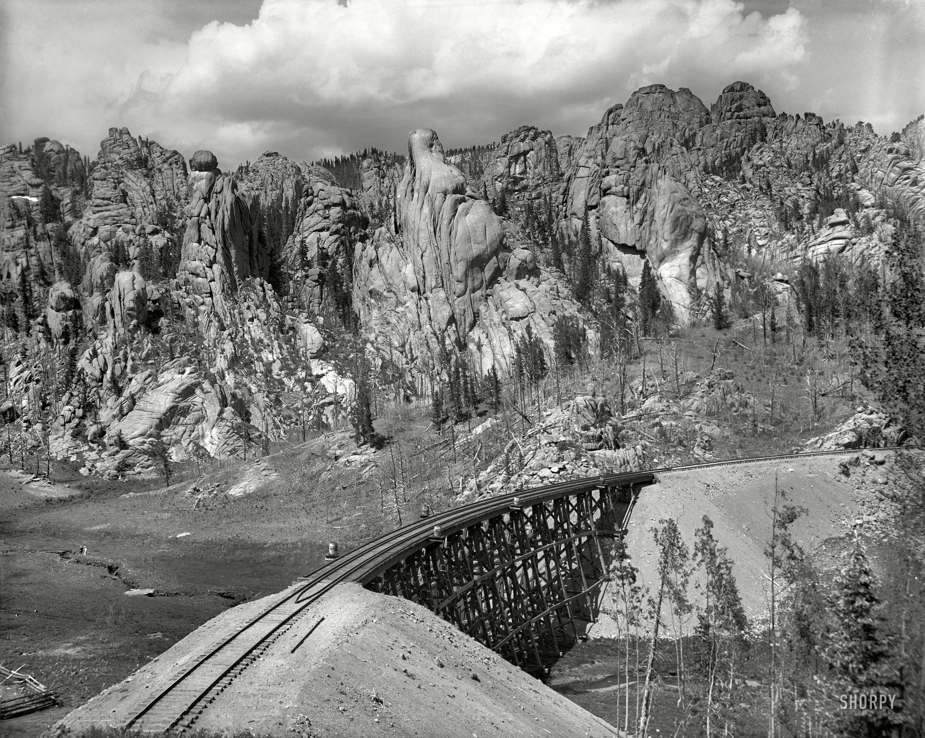 Colorado circa 1901. "Cathedral Park near Clyde. Colorado Springs & Cripple Creek Short Line." A gray day in the Rockies. 8x10 inch glass transparency by William Henry Jackson, Detroit Publishing Company. View full size.