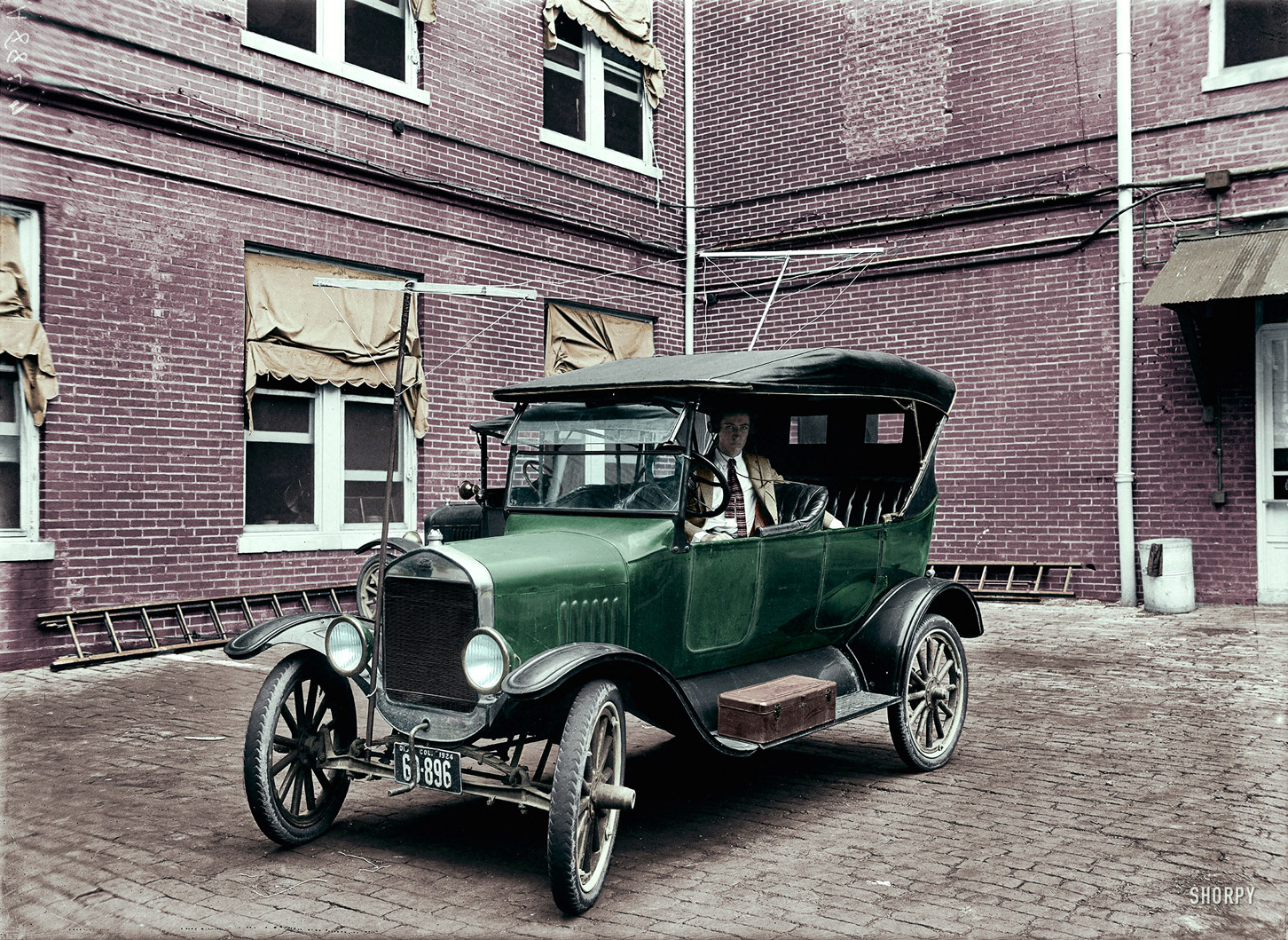 Colorized from this Shorpy photo. In the original the car seemed to be all black, but I thought I'd color it green for extra vibrance. View full size.