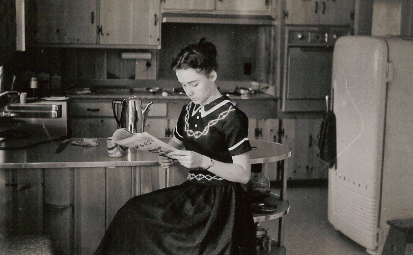 An unknown, cute, relative in Papa's (my wife's grandfather) kitchen. Probably taken around the same time as my wife's aunt's wedding. View full size.
