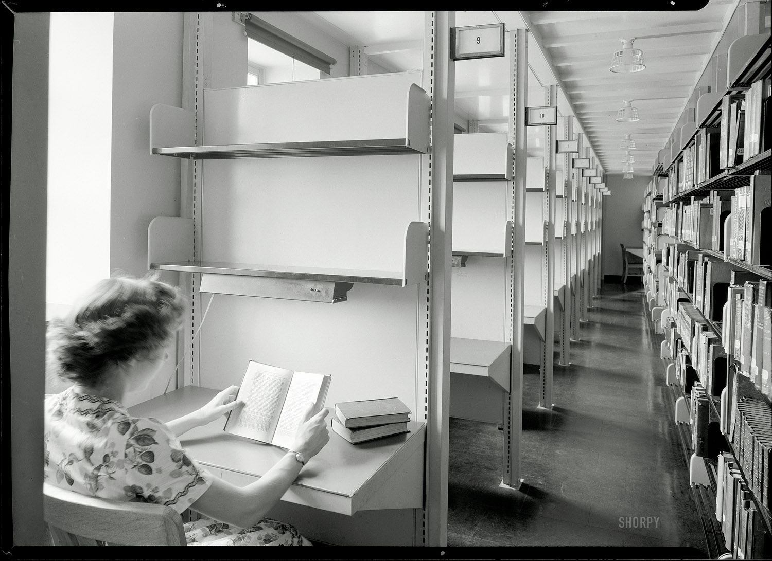 June 29, 1944. "Connecticut College for Women, New London. Palmer Library, carrels in stack room." Safety negative by Gottscho-Schleisner. View full size.