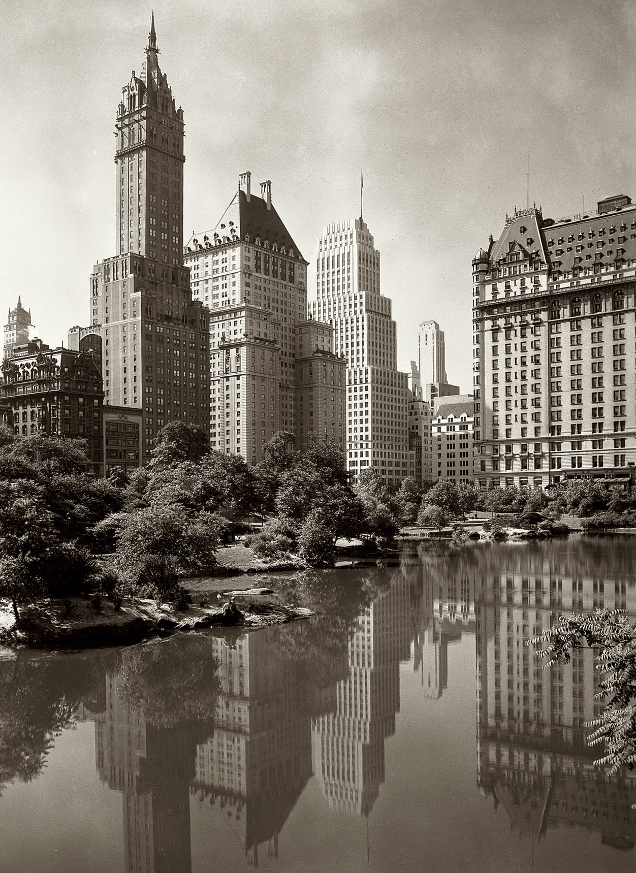 1933. A view across New York's Central Park Lake framed by the Sherry-Netherland and Plaza hotels. 5x7 safety negative by the noted architectural photographer Samuel H. Gottscho. View full size.