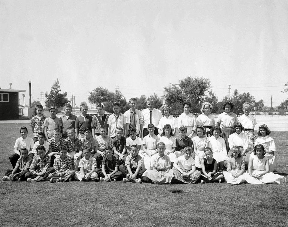 Mr. Matthew Kim's 6th grade class at Ralph Waldo Emerson Elementary School, Long Beach, California, likely during May 1960. Though the class had 38 students Mr. Kim maintained control of us, probably through techniques he learned as a U.S. Marine. On his days off he was an engineer on the train at Disneyland. In 1995 he was still at Disneyland and my 5 year old daughter and I rode with him in the cab of the engine.

After 6th we went to junior high school for 7th-9th. The high school was across the street from Emerson so many of us graduated together in a class of 1200 baby boomers. In 2016 it will be time for our 50th anniversary reunion. I'm in the second row, third from the left, in a plaid shirt. View full size.