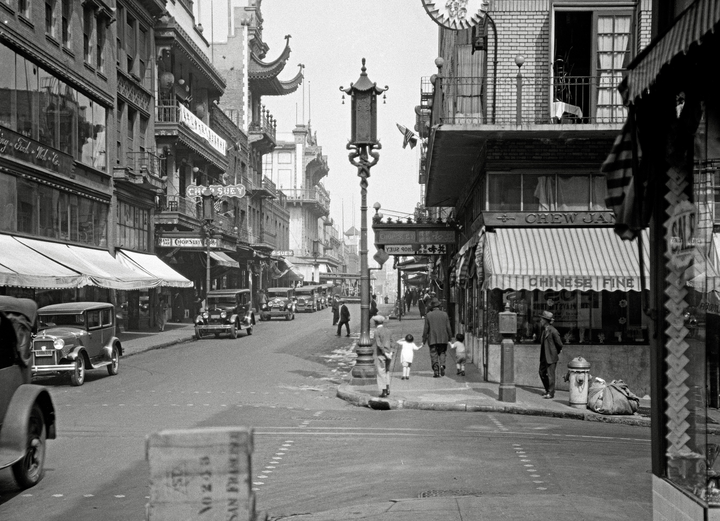 San Francisco circa 1930. "Grant Avenue at Sacramento Street." 4x5 inch nitrate negative by Arnold Genthe. View full size.