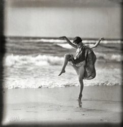 Long Beach, Long Island, New York, circa 1921. "Anna (Denzel) Duncan dancing." One of the "Isadorables," as Isadora Duncan's German proteges were known. Glass transparency by Arnold Genthe. View full size.
Call the Swimsuit PoliceShe's showing leg all the way to the ground!
[Not to mention the other direction. - Dave]
Karate KidAll that's missing is a pier timber.
Aaaack!  Something touched my foot!
Post processing.Looks like a bit of re-touching has been applied, thankfully.
Never Turn Your Back On the SurfBut sideways is okay if you have excellent peripheral vision.
Later. in the New Yorker...Tell me Thurber never saw that picture!
(The Gallery, Arnold Genthe, Dance)