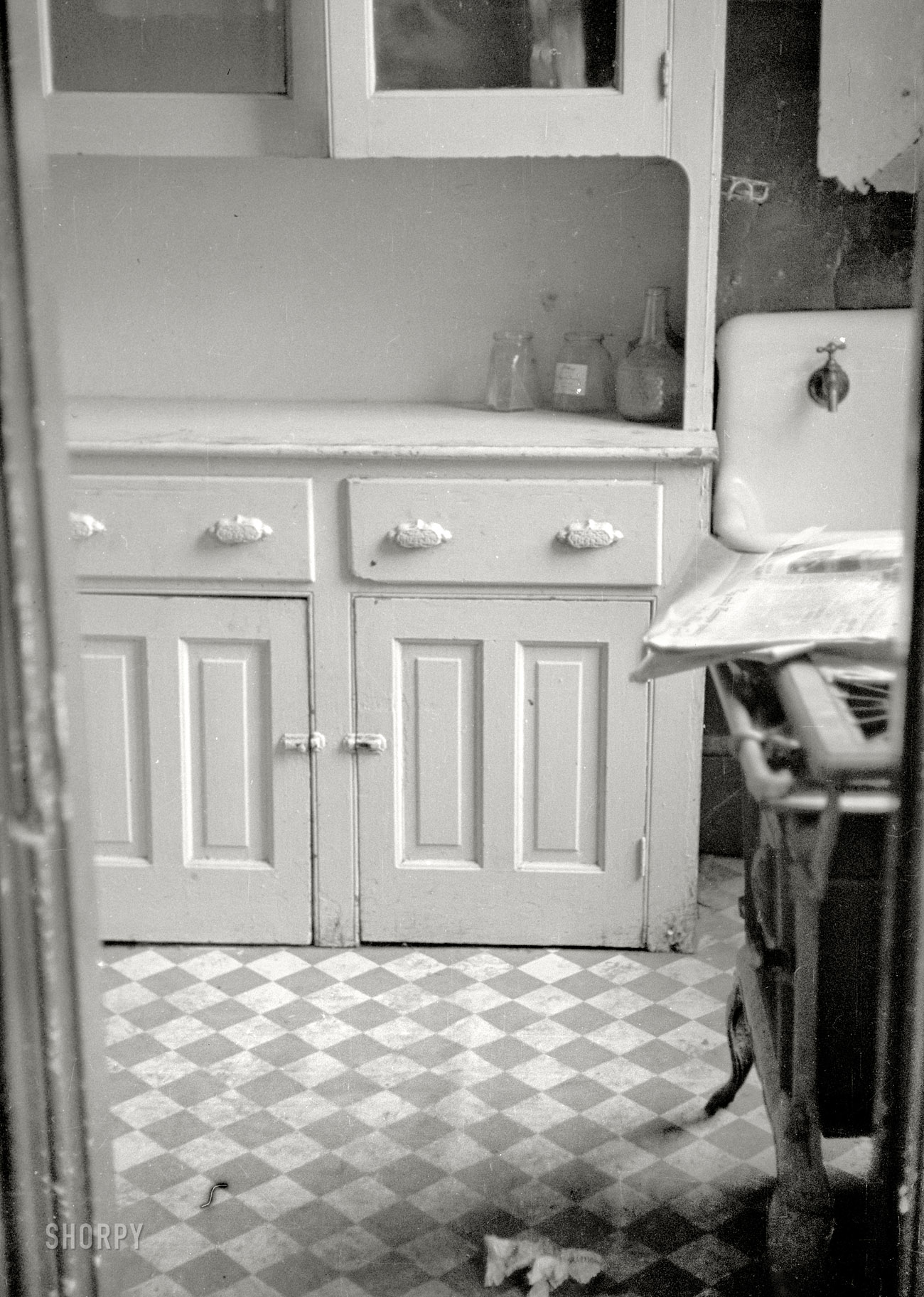 July 1935. "Kitchen of an apartment available for rent in the District of Columbia." One of hundreds of photographs taken by Carl Mydans to document housing conditions in the poorer sections of Washington, D.C., during the Depression. 35mm nitrate negative for the Resettlement Administration. View full size. 