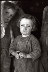 Baby girl of family living on Natchez Trace Project, near Lexington, Tennessee. March 1936. View full size. Photograph by Carl Mydans.