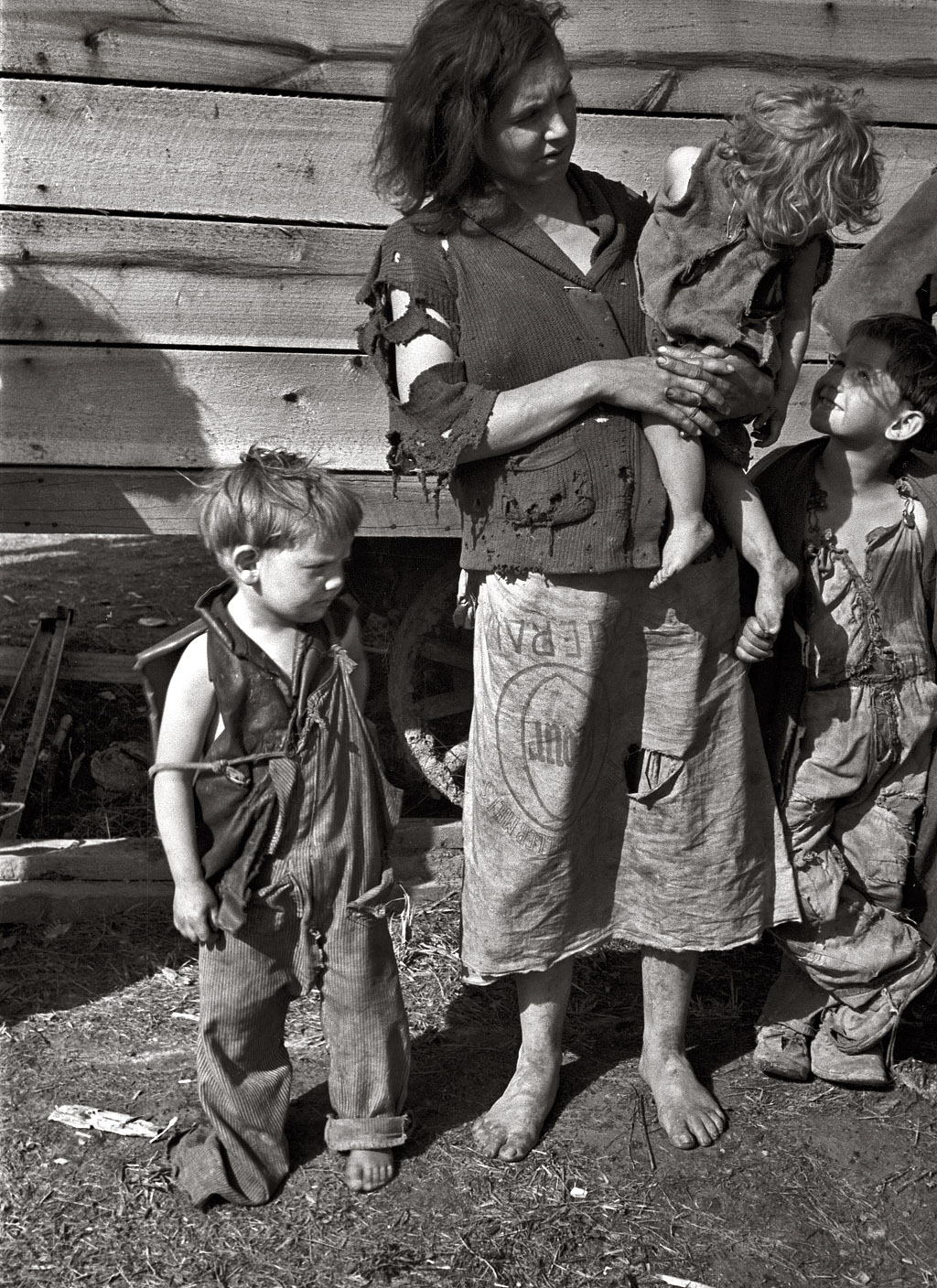 March 1936. "Mother and baby of family of nine living in field on U.S. Route 70 near the Tennessee River." 35mm nitrate negative by Carl Mydans for the Farm Security Administration. View full size.