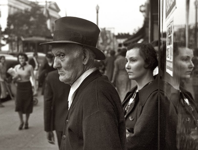 Photo of: Bystander: 1937 -- December 1937. Street scene in Washington, D.C. View full size. 35mm nitrate negative by John Vachon for the Farm Security Administration.
