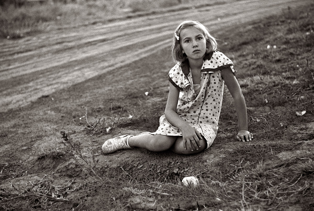 October 1938. Farm girl in Seward County, Nebraska. View full size. 35mm nitrate negative by John Vachon for the Farm Security Administration.