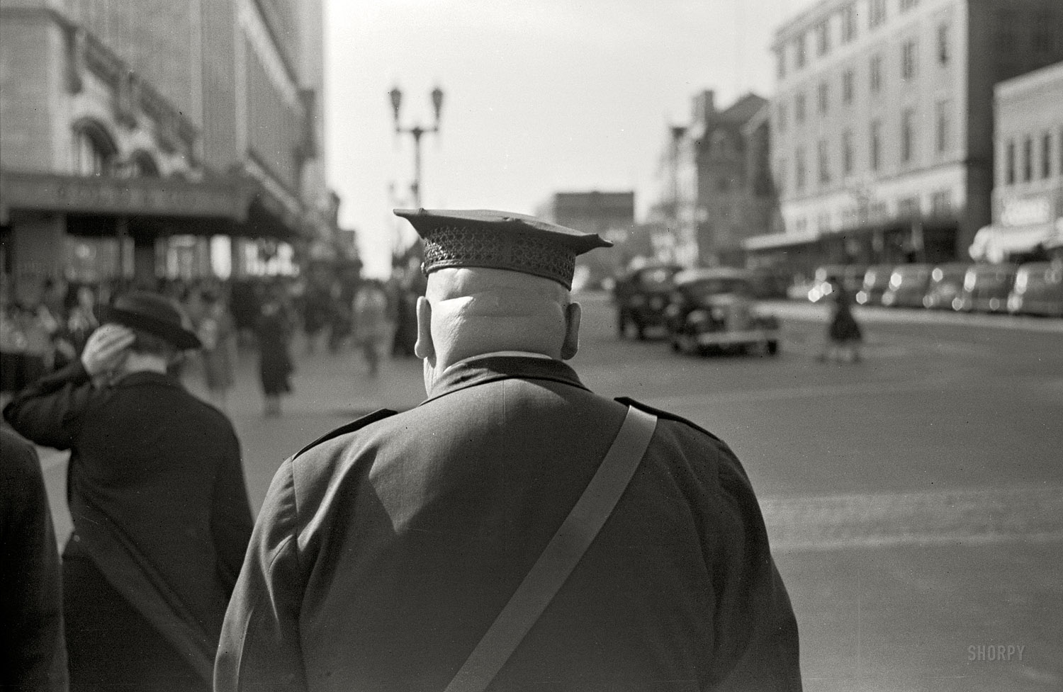 October 1938. "Policeman, Lincoln, Nebraska." 35mm nitrate negative by John Vachon for the Resettlement Administration. View full size.