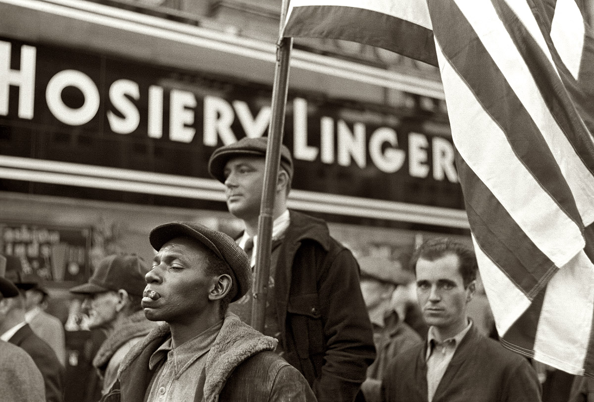 November 1938. "Watching the Armistice Day parade. Omaha, Nebraska." 35mm negative by John Vachon for the Farm Security Administration. View full size.