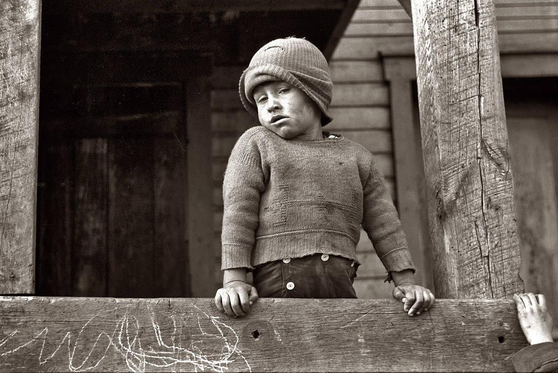 May 1939. Coal miner's son in Kempton, West Virginia. View full size. 35mm nitrate negative by John Vachon, Farm Security Administration.