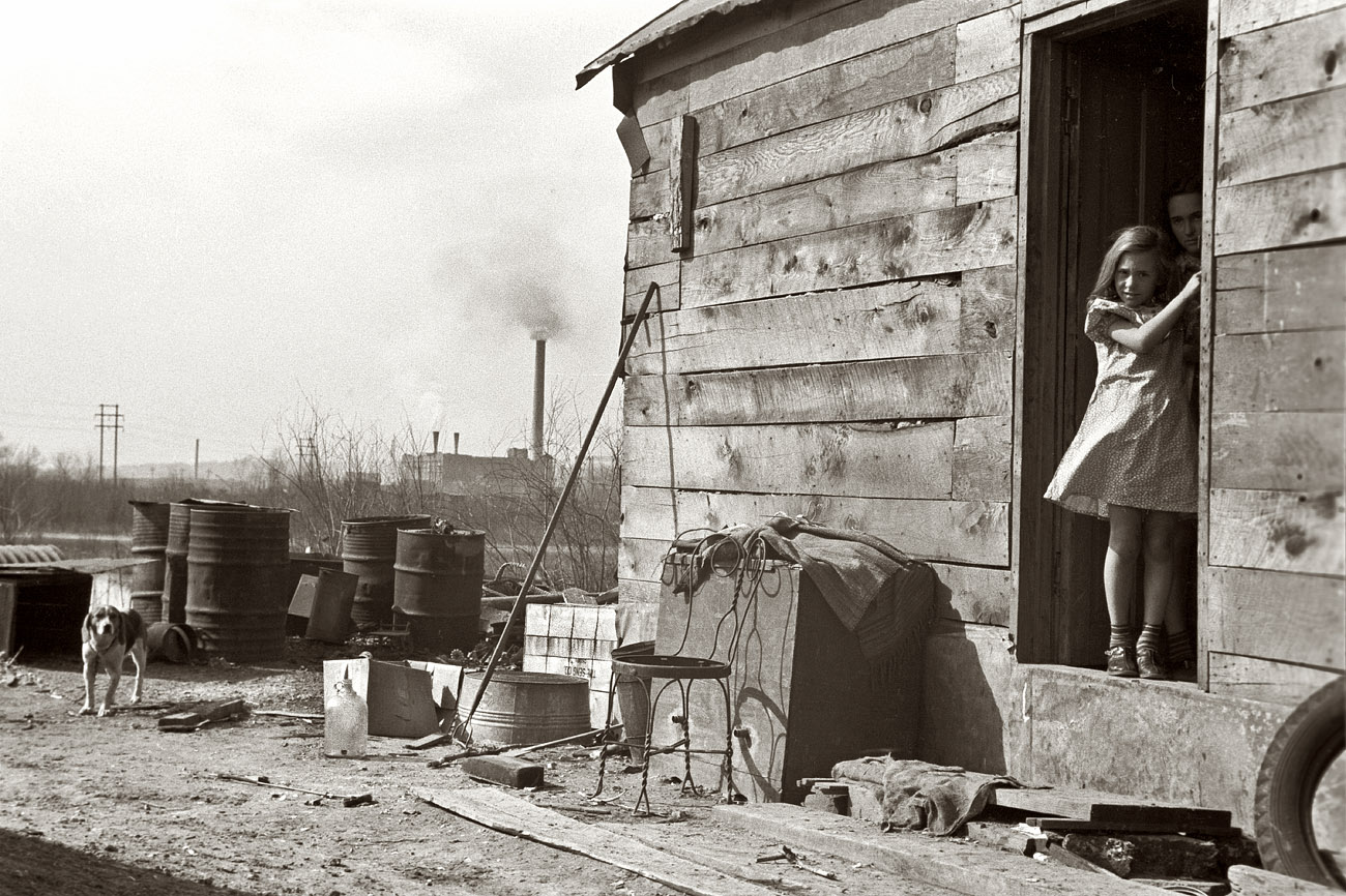 April 1940. Shacktown in Dubuque, Iowa. Many residents keep a cow or a few chickens.  View full size. 35mm nitrate negative by John Vachon for the FSA.