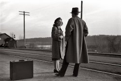 April 1940. East Dubuque, Illinois. "Waiting for the train to Minneapolis." 35mm nitrate negative by John Vachon. View full size.
Wow ...This nearly an Edward Hopper painting.
I was thinking the same thingThe light is fantastic, isn't it?
Wow! There&#039;s a story there.Wow! There's a story there.
There&#039;s a story alright..."C'mon train, come on. Get me away from this creep!"
Movie StillHaven't seen this one before. Nice cinematic look to it.
(The Gallery, John Vachon, Railroads)